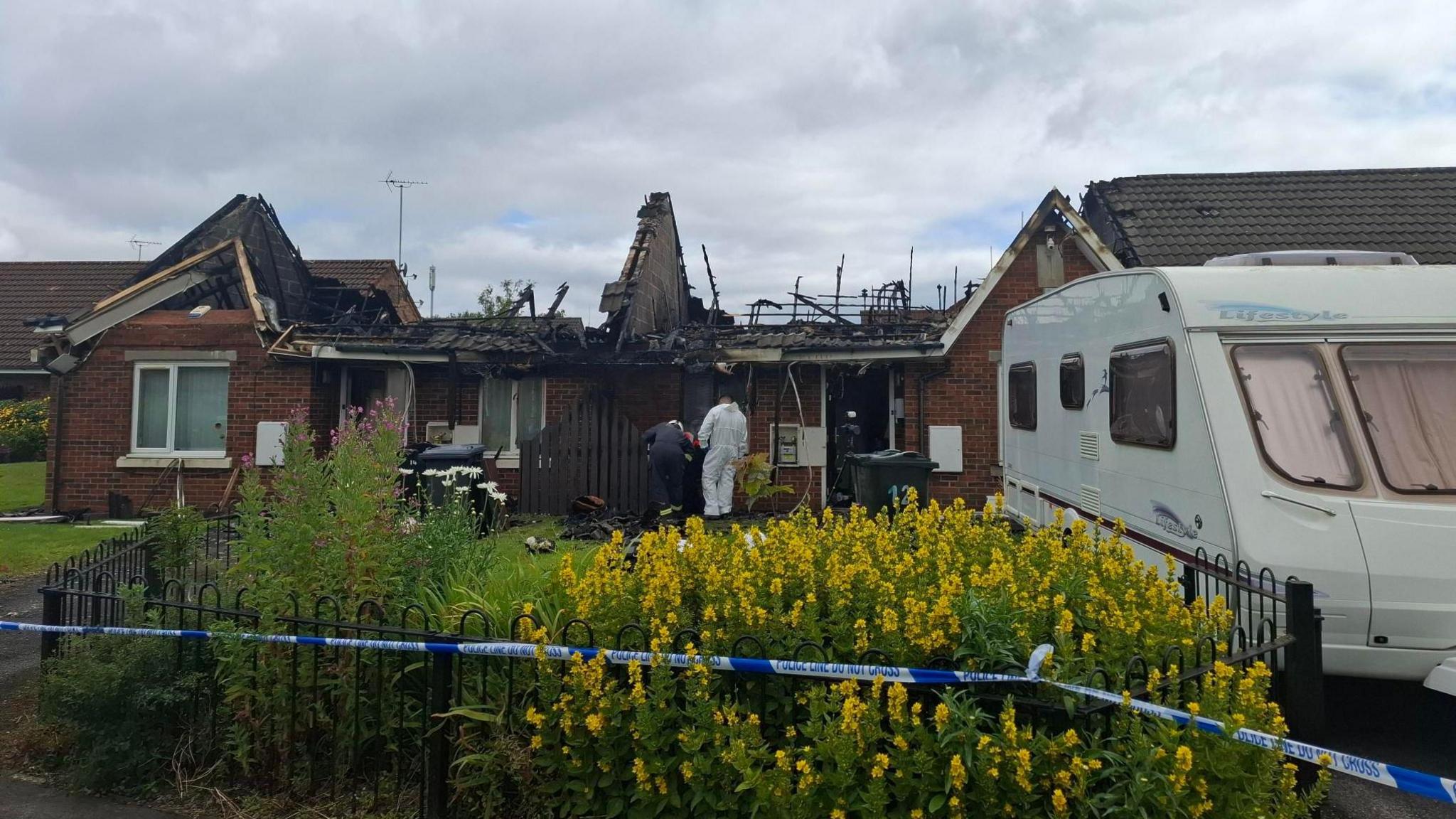 The aftermath of a fire on The Crescent, in the Buttershaw area of Bradford