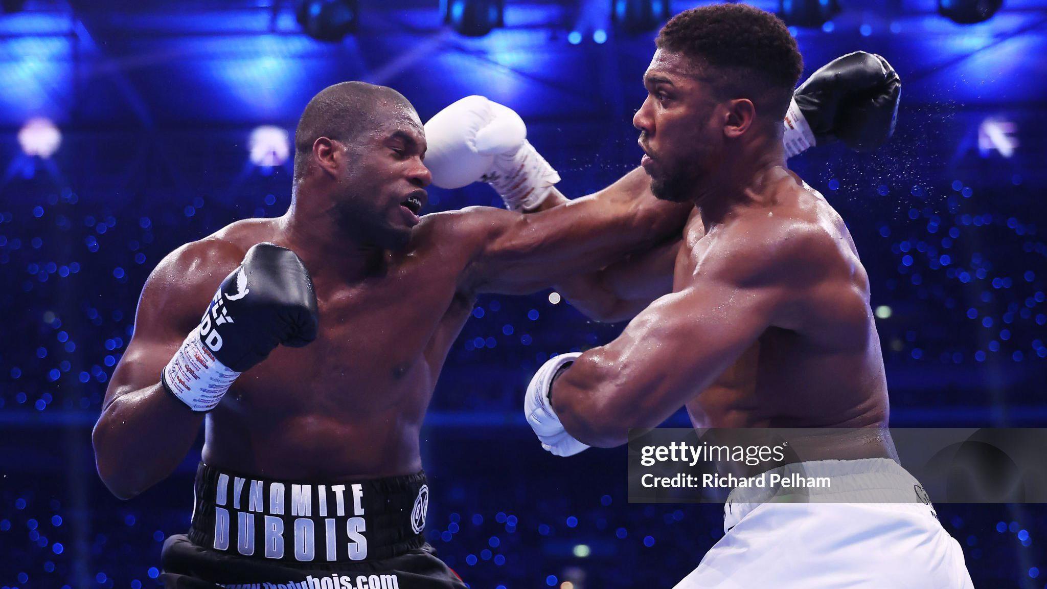 Anthony Joshua and Daniel Dubois fighting at Wembley on 21 September.