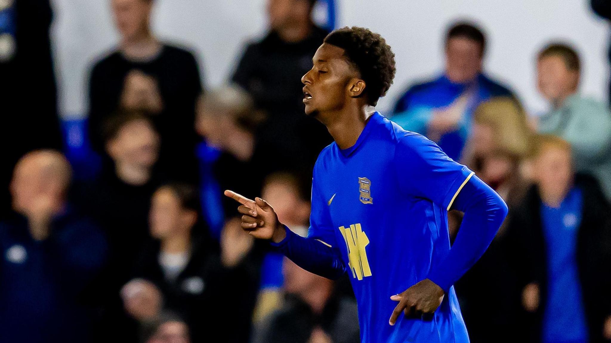 Demarai Gray jogs back to the centre circle after scoring for Birmingham City