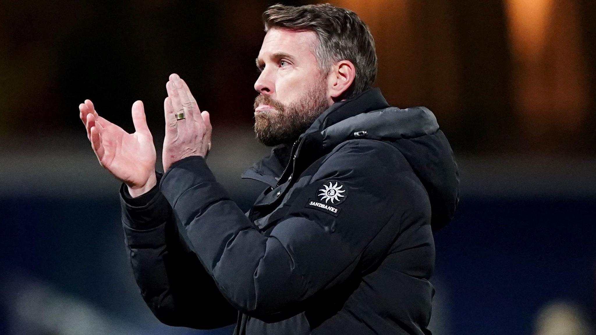 Rob Edwards applauds Luton's fans after defeat to QPR at Loftus Road