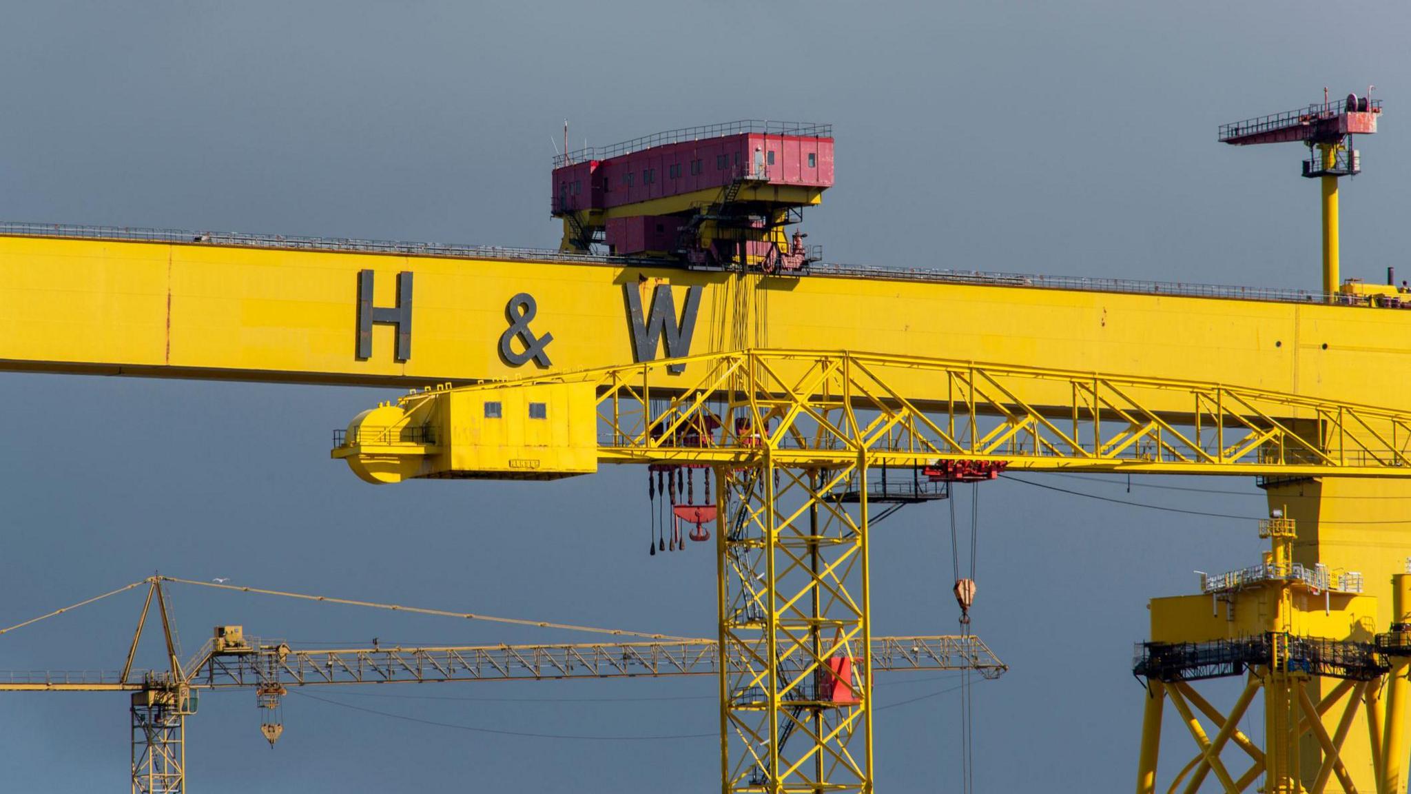 Yellow cranes at the Belfast dry docks on the site of the former Harland and Wolff shipyard where the Titanic was built.