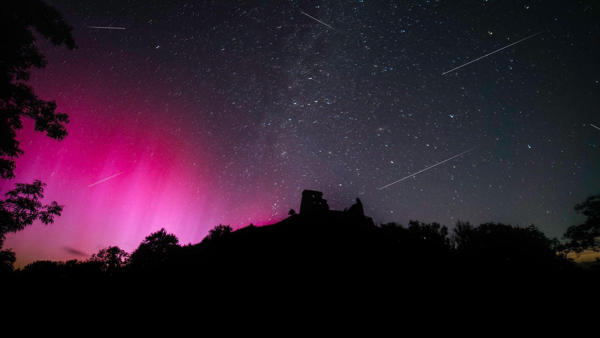 Picture of the pink sky filled with stars in Dryslwyn, Carmarthenshire 