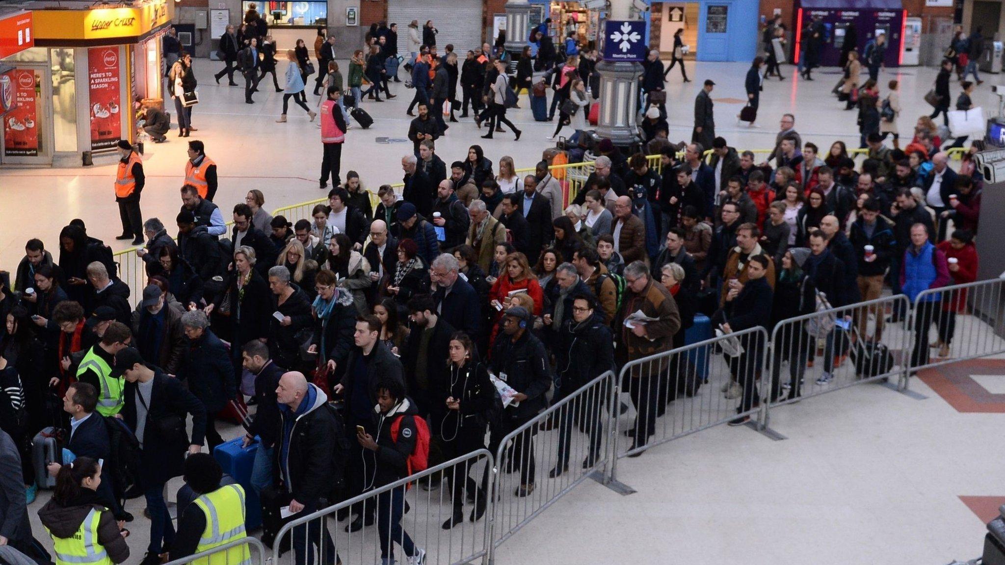 Queues for the Gatwick Express at London Victoria