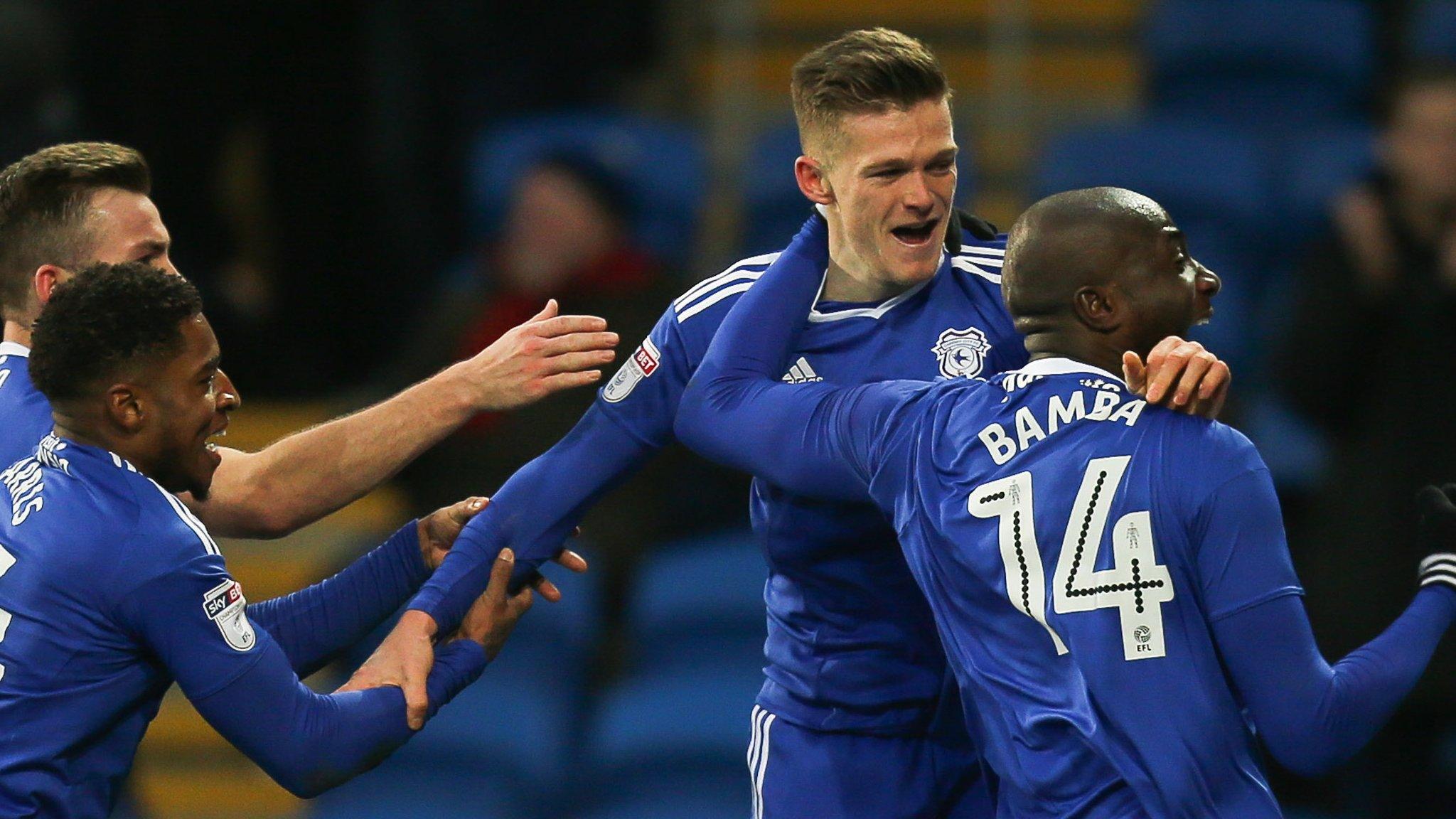 Cardiff City celebrate their late winner against Burton