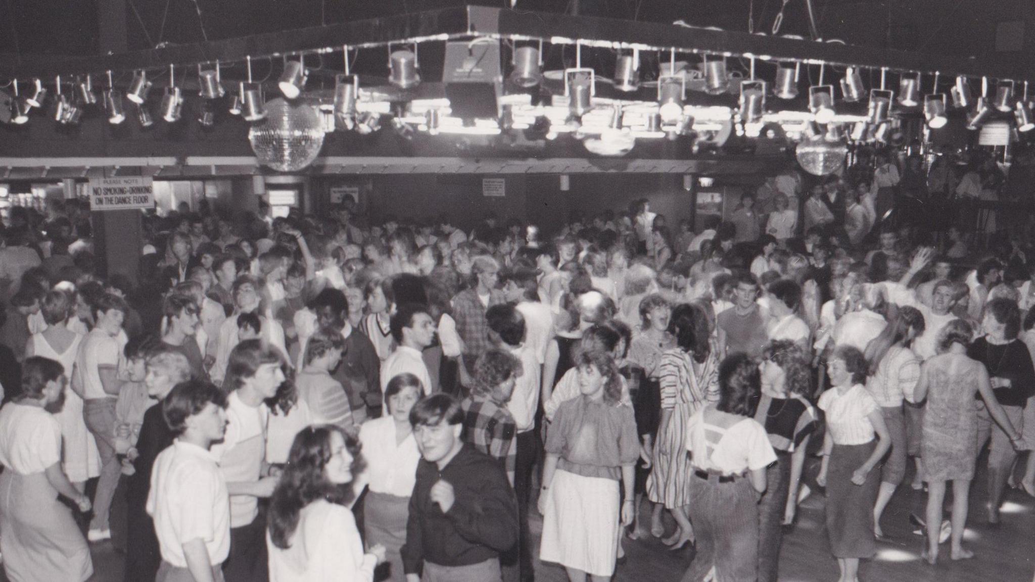 A black and white image of Raquel's in the 1970s or 1980s.