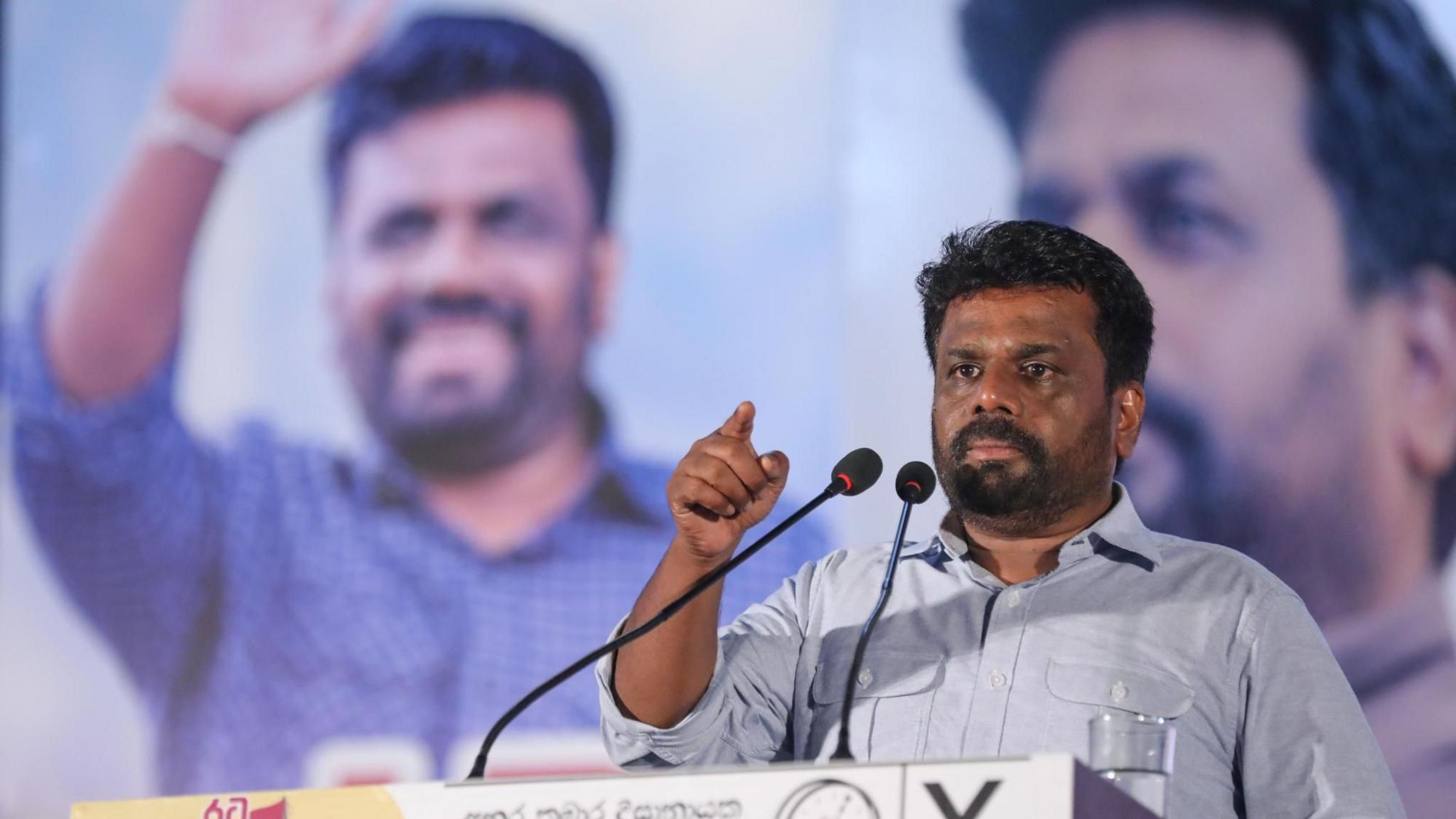 Anura Kumara Dissanayake speaks to his supporters during a campaign rally