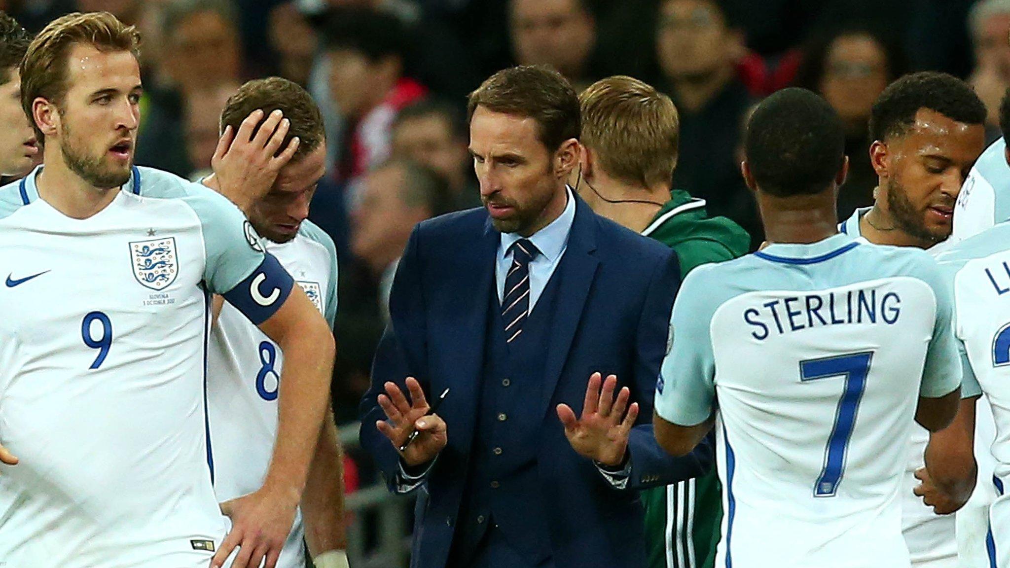 Gareth Southgate talks to his England players