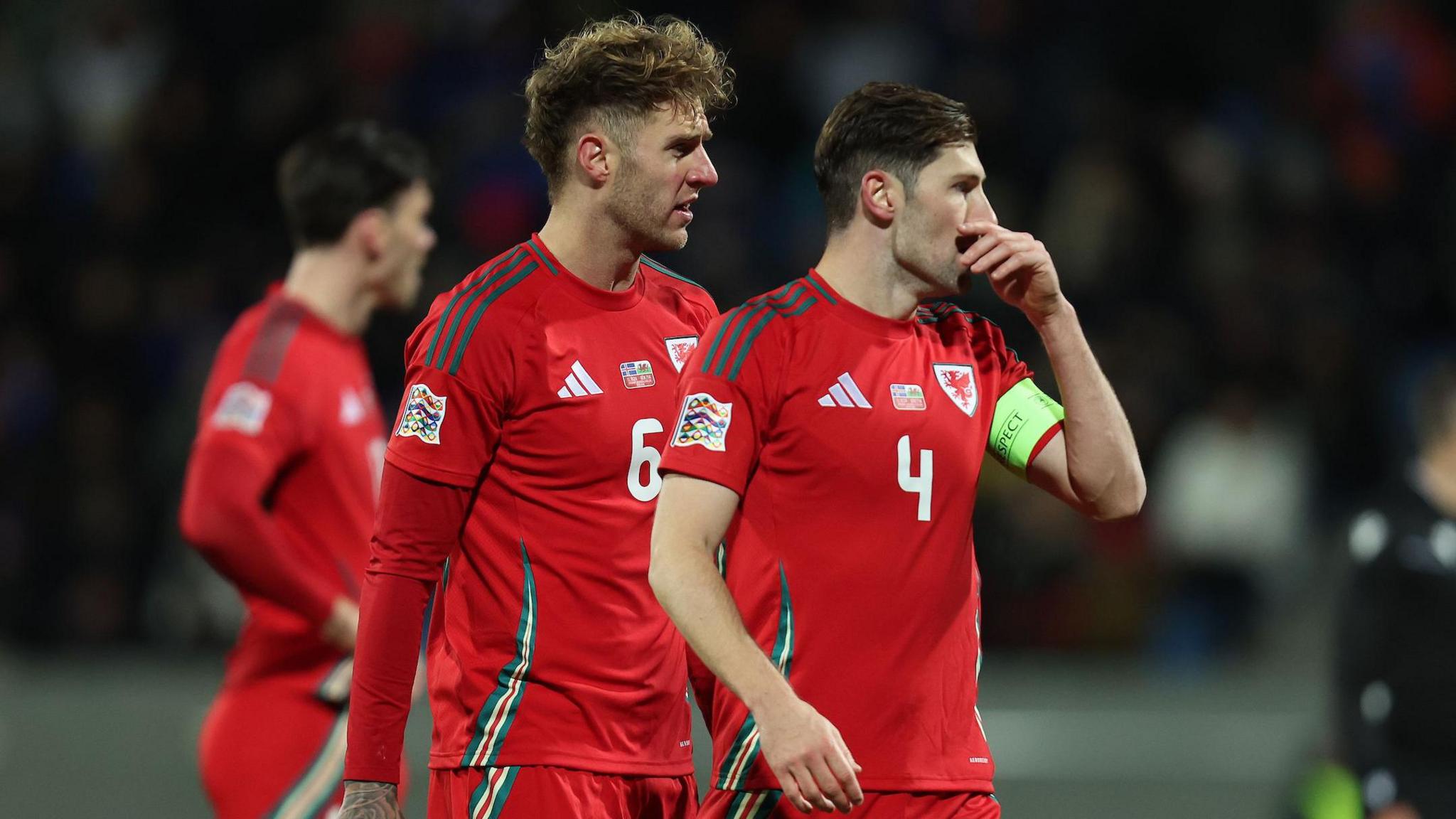 Wales' Joe Rodon and Ben Davies look on