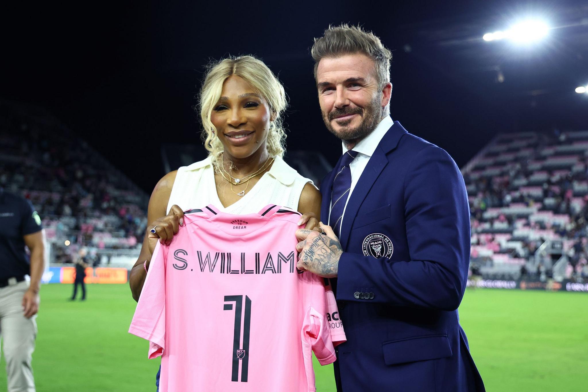 Tennis great Serena Williams is given an Inter Miami shirt by the club's co-owner David Beckham at their match against New York City