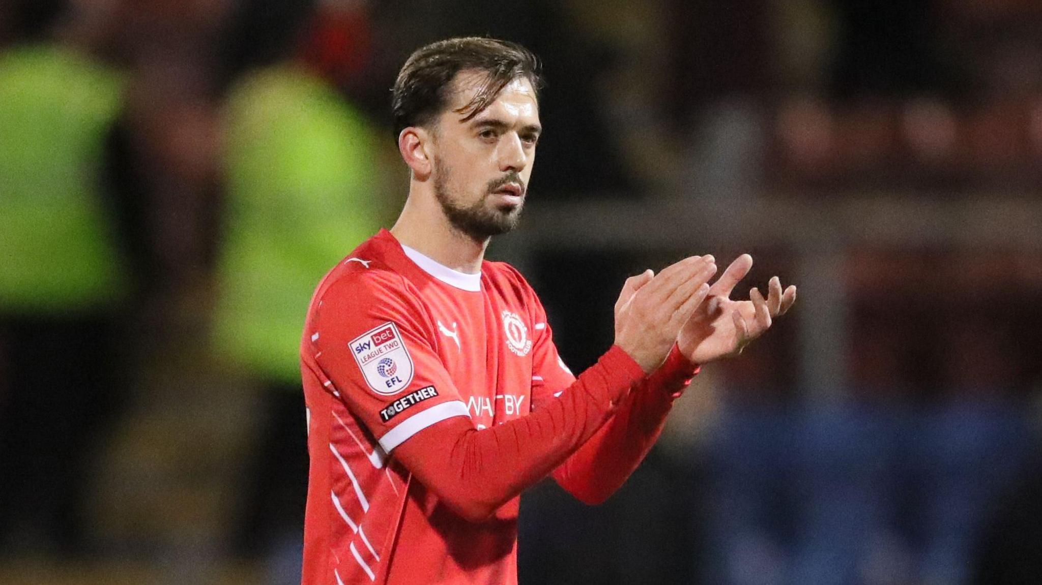 Jack Powell applauds the fans during his time with Crewe Alexandra