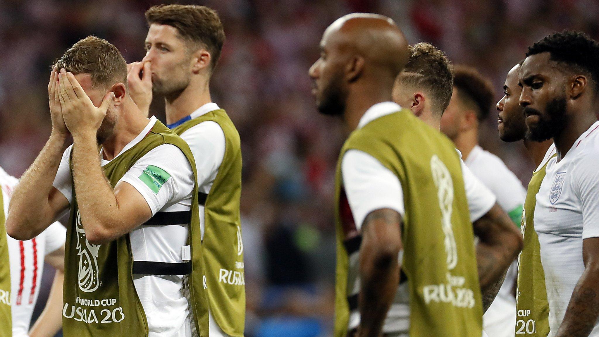 England's players react after losing to Croatia