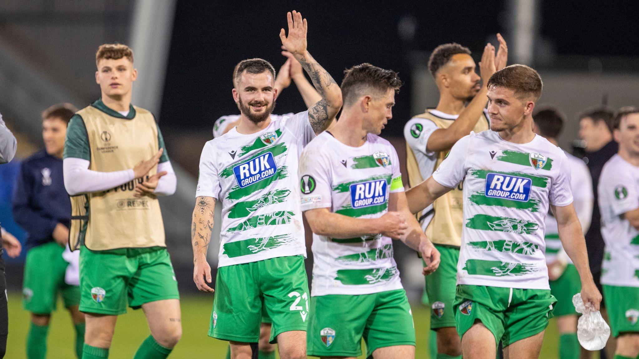 The New Saints players applaud the crowd after victory against Astana