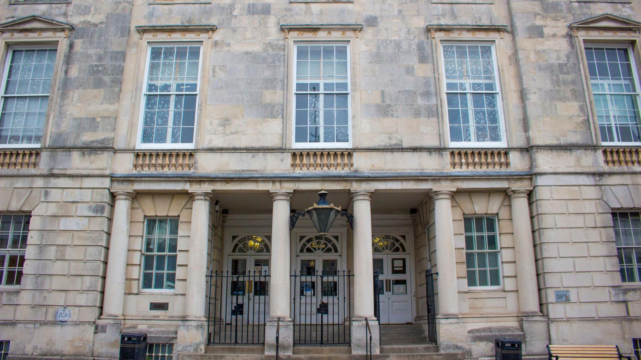 A white stone building. 
