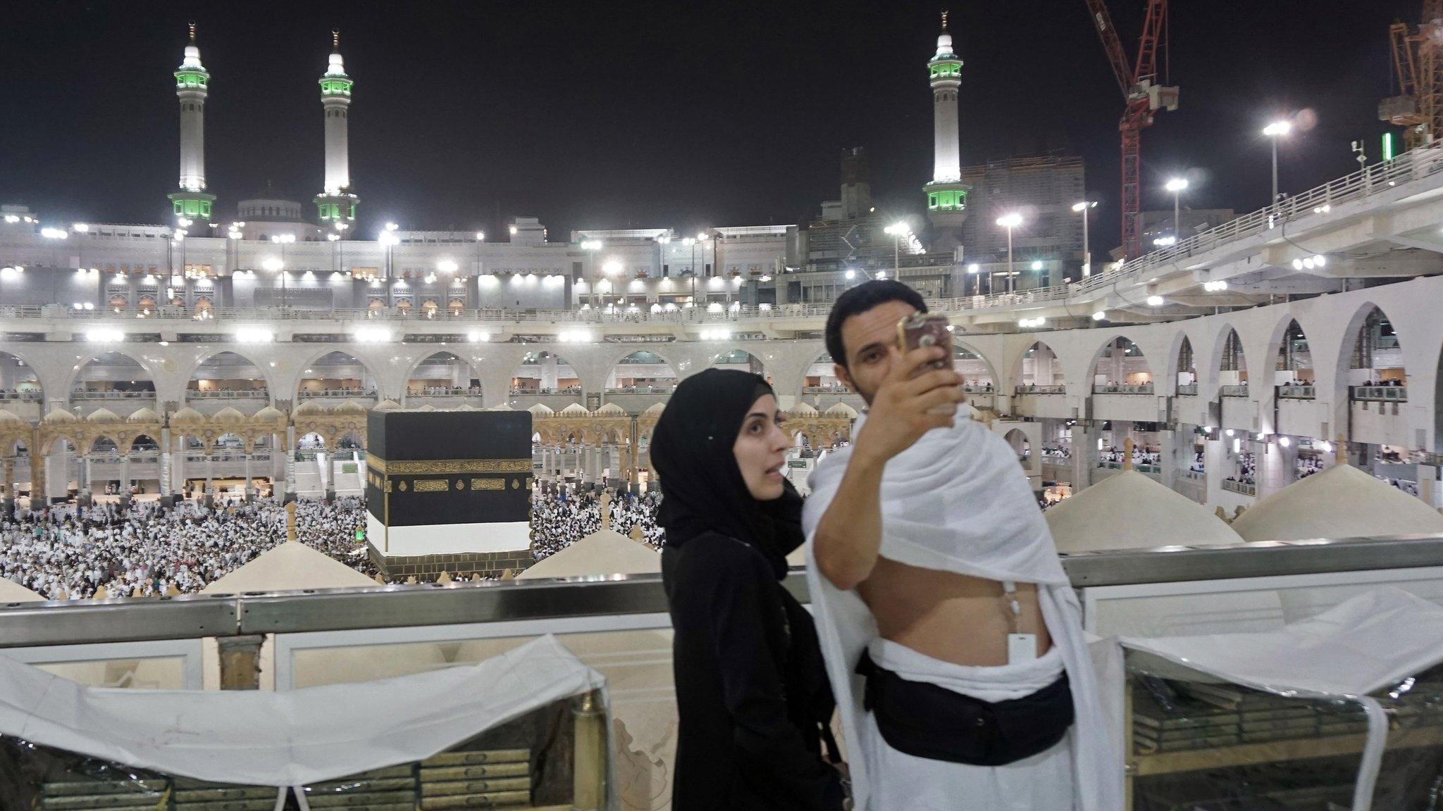 Muslim pilgrims take a selfie inside Mecca's Grand Mosque at the start of the Hajj (30 August 2017)