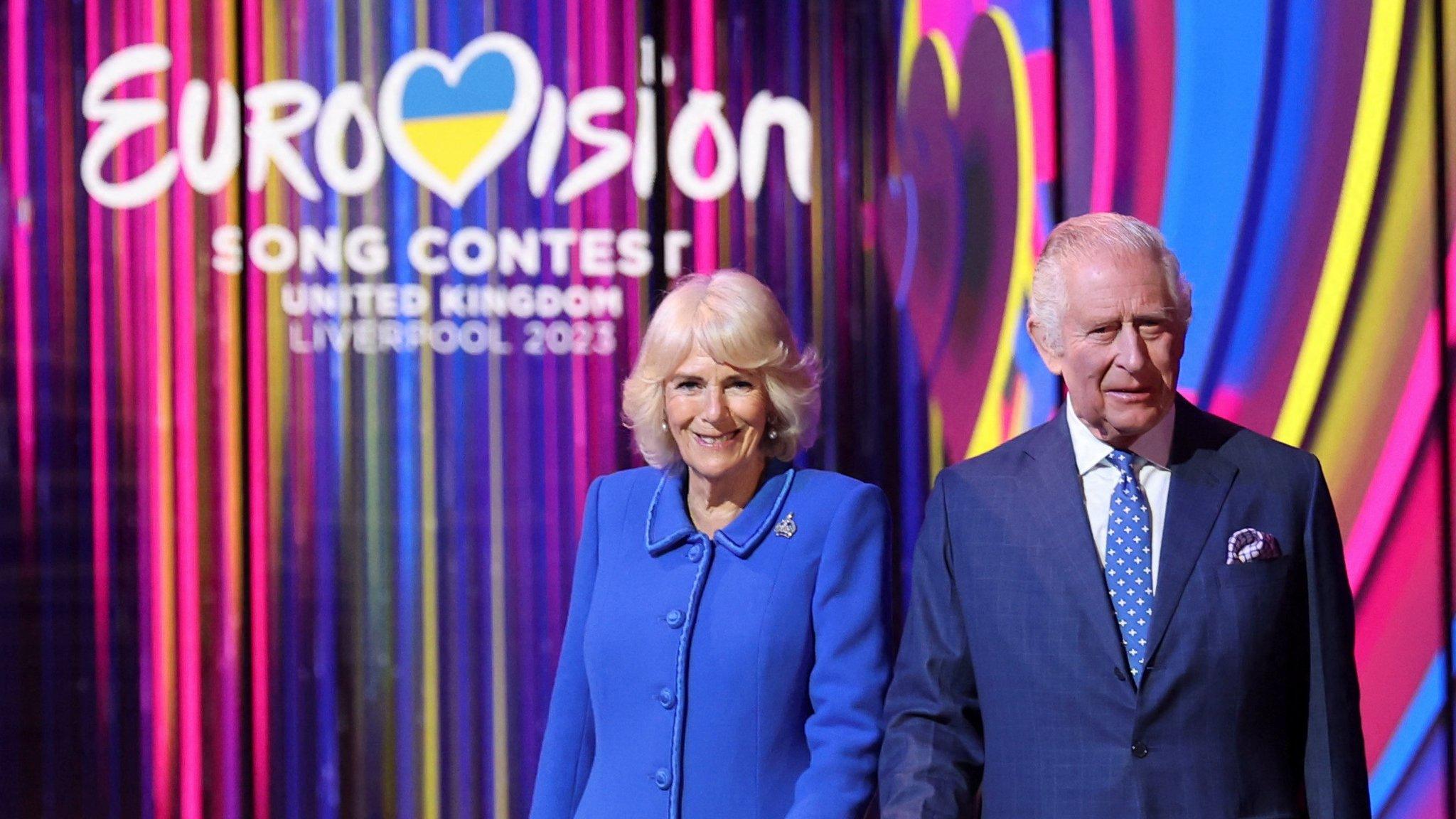 King Charles and Camilla, Queen Consort switch on stage lighting as they visit the host venue of this year's Eurovision Song Contest, the M&S Bank Arena in Liverpool