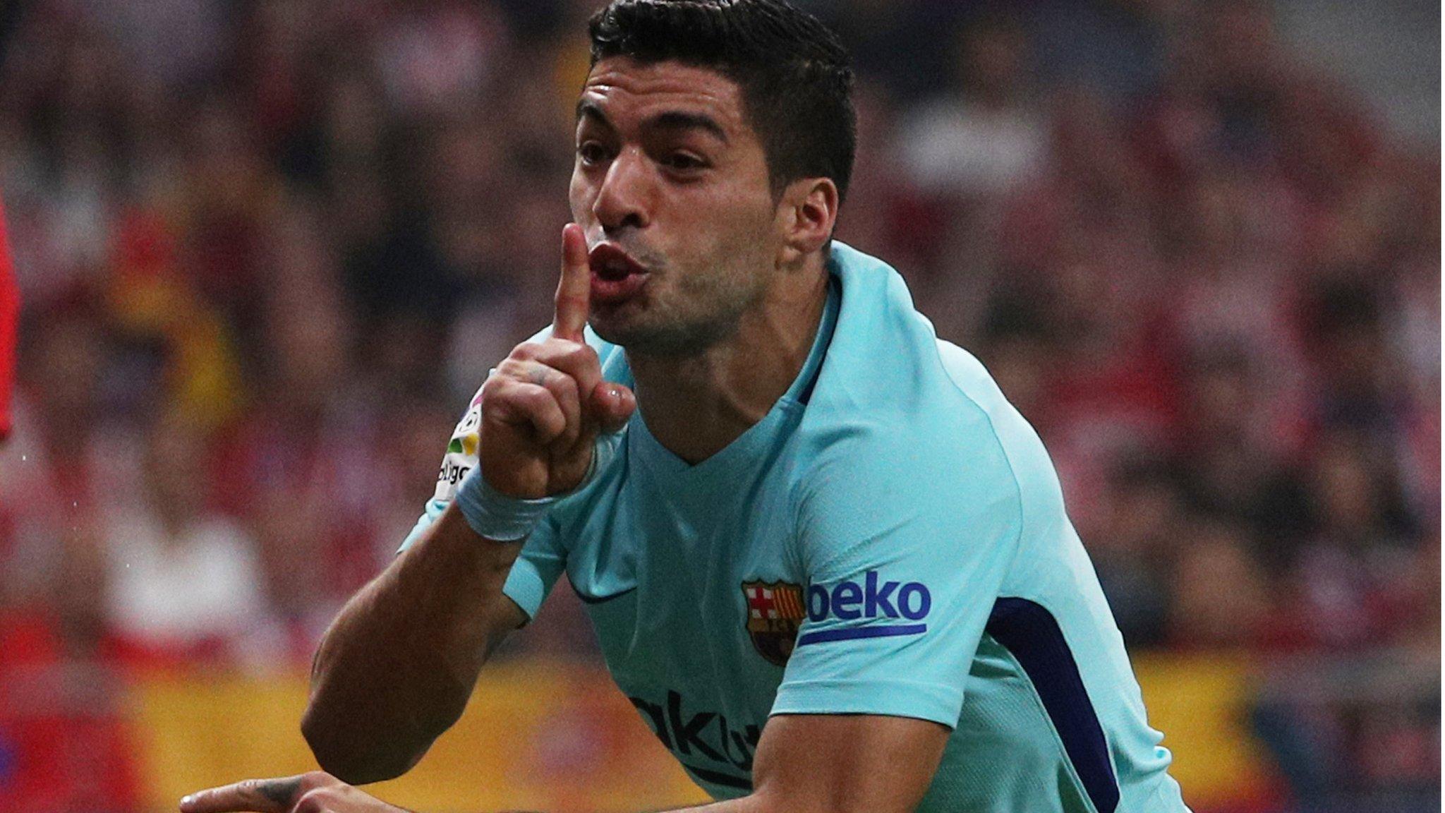 Luis Suarez celebrates