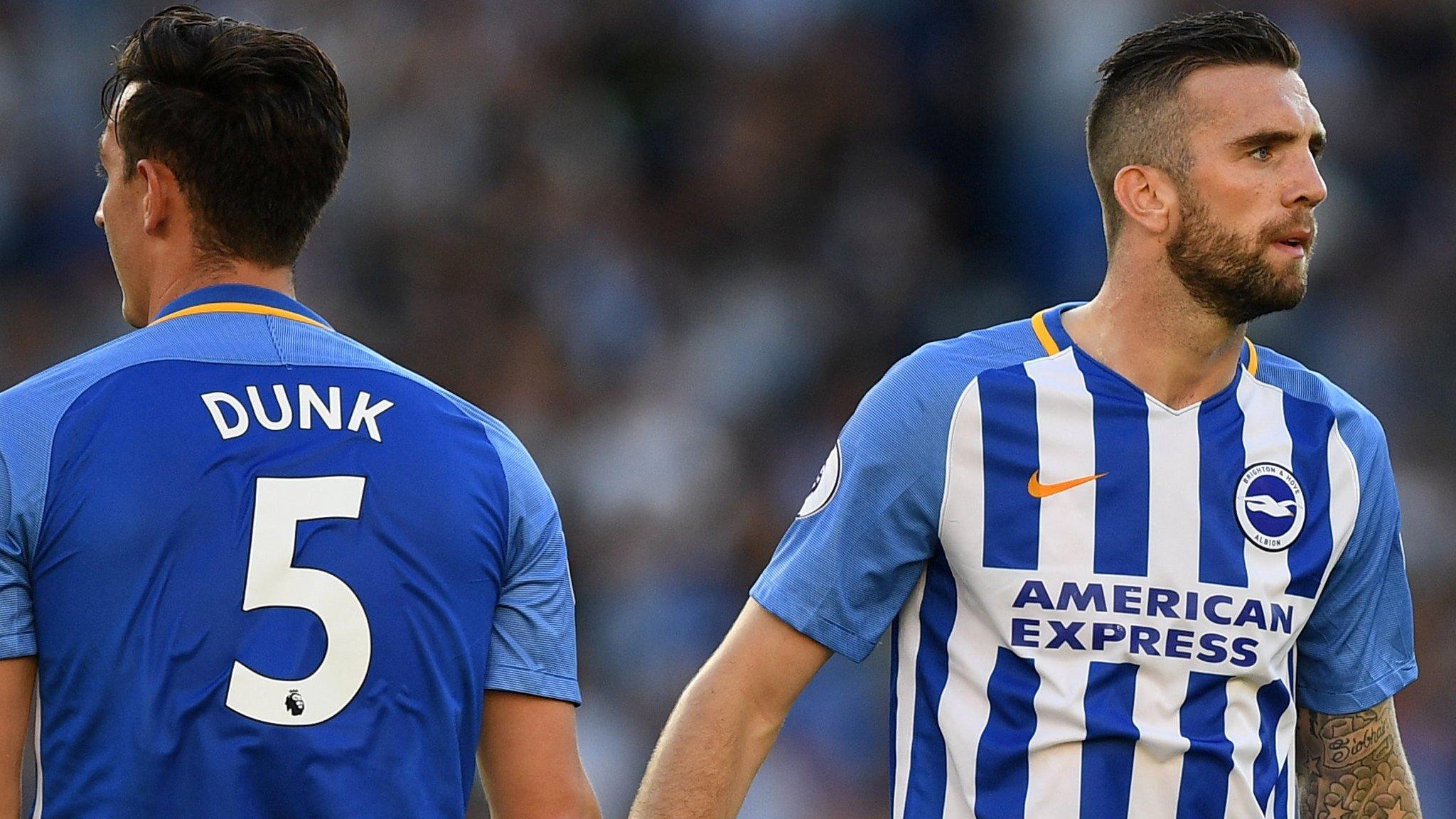 Lewis Dunk and Shane Duffy