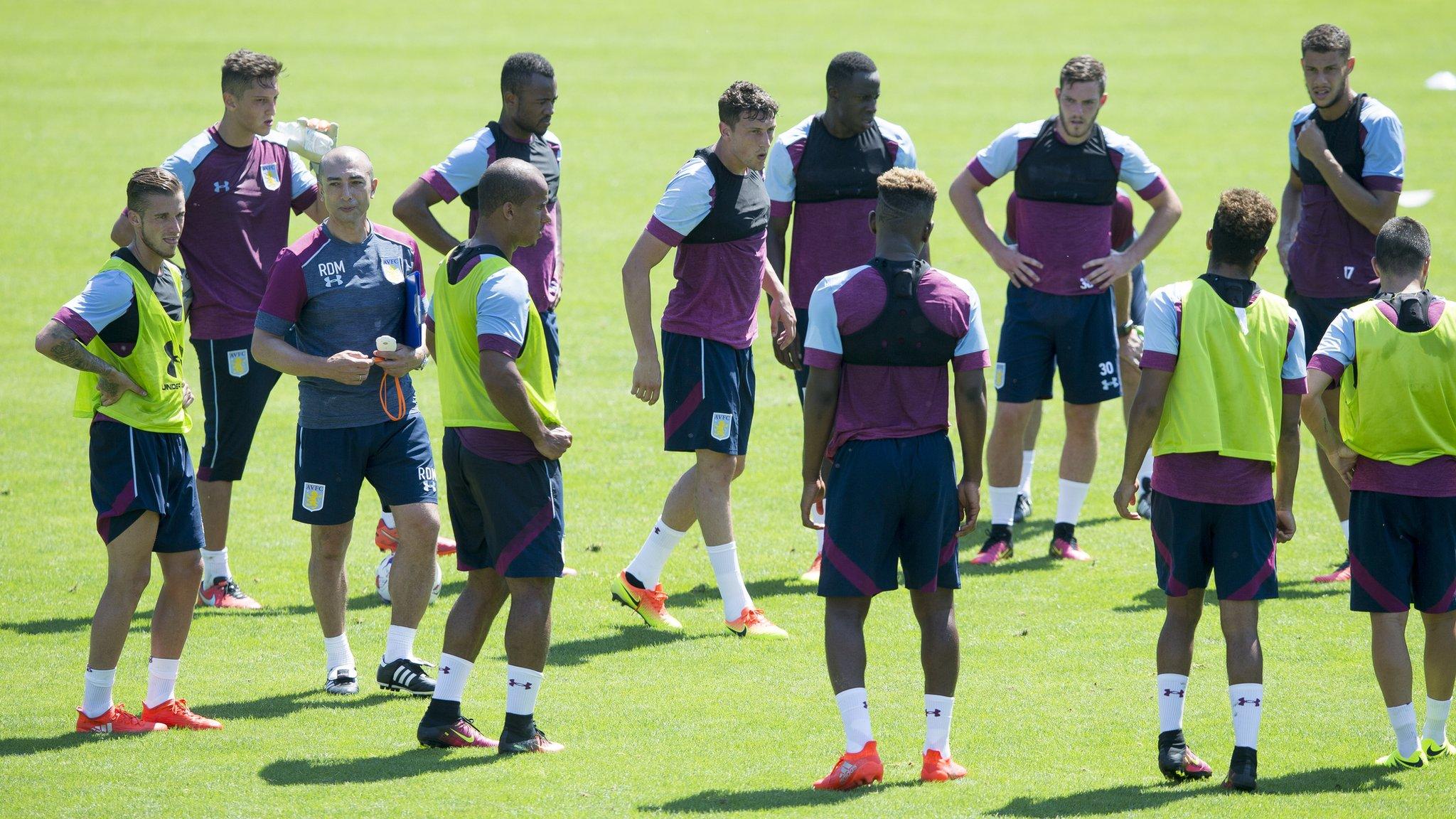 Roberto Di Matteo (third left) with some of the Aston Villa squad