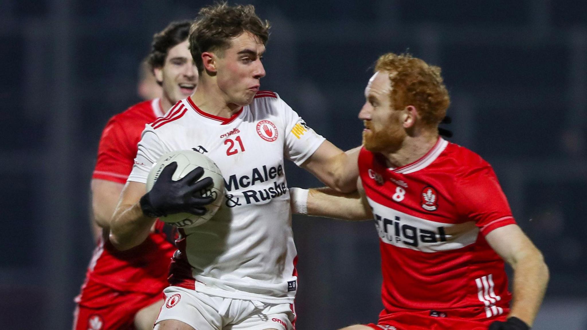 Conor Glass challenges Conor O'Neill during Derry's league victory over Tyrone in January 