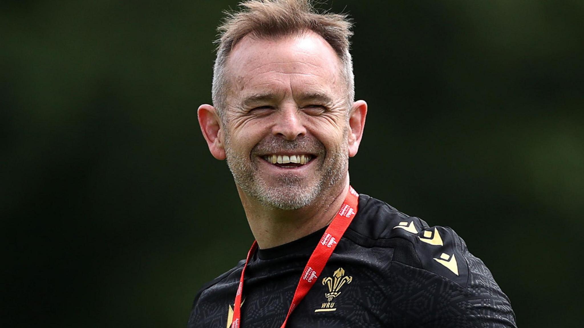 Danny Wilson smiling during Wales training