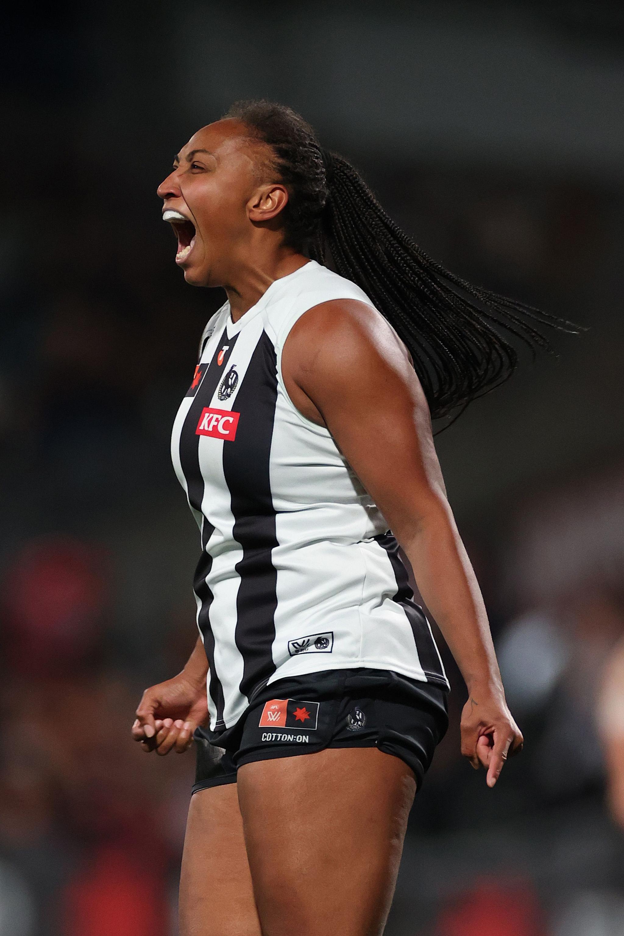Magpies' Sabrina Frederick celebrates kicking the opening goal during the AFLW Round one match between Carlton Blues and Collingwood Magpies at Ikon Park in Melbourne, Australia. Photo by Kelly Defina