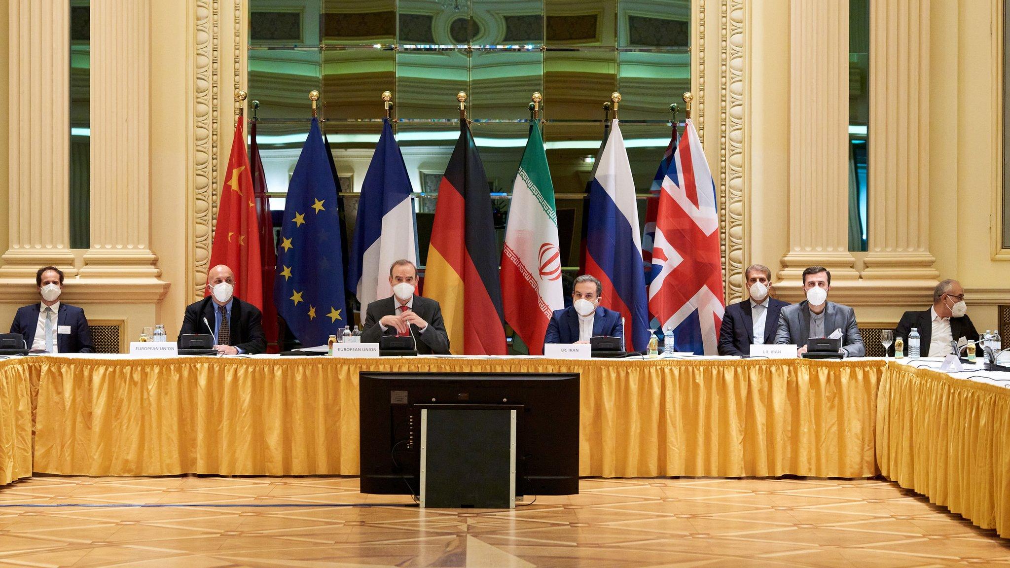 European External Action Service (EEAS) Deputy Secretary General Enrique Mora and Iranian Deputy at Ministry of Foreign Affairs Abbas Araghchi wait for the start of a meeting of the JCPOA Joint Commission in Vienna, Austria (6 April 2021)