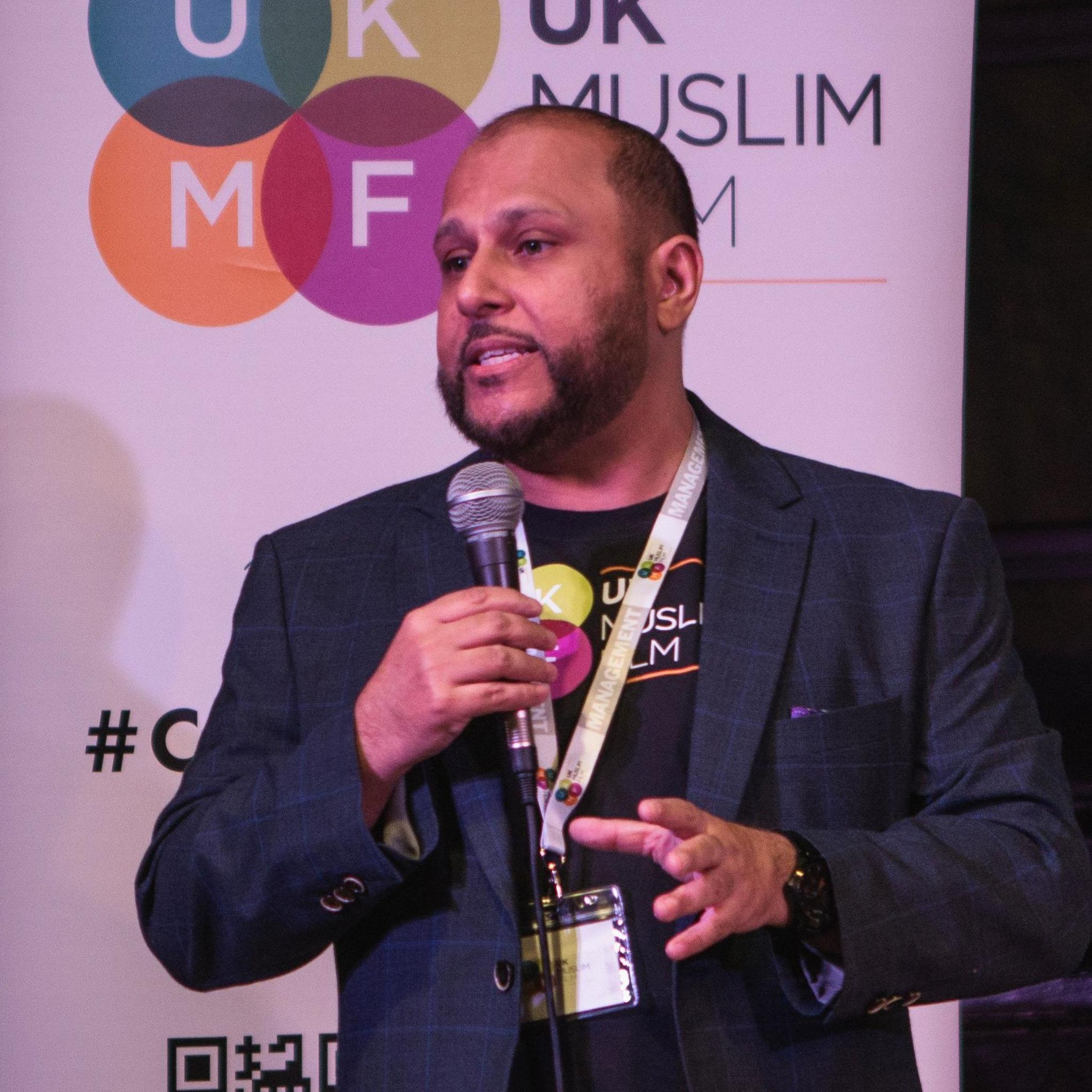 Sajid Varda, director of the Muslim International Film Festival, speaking with a microphone