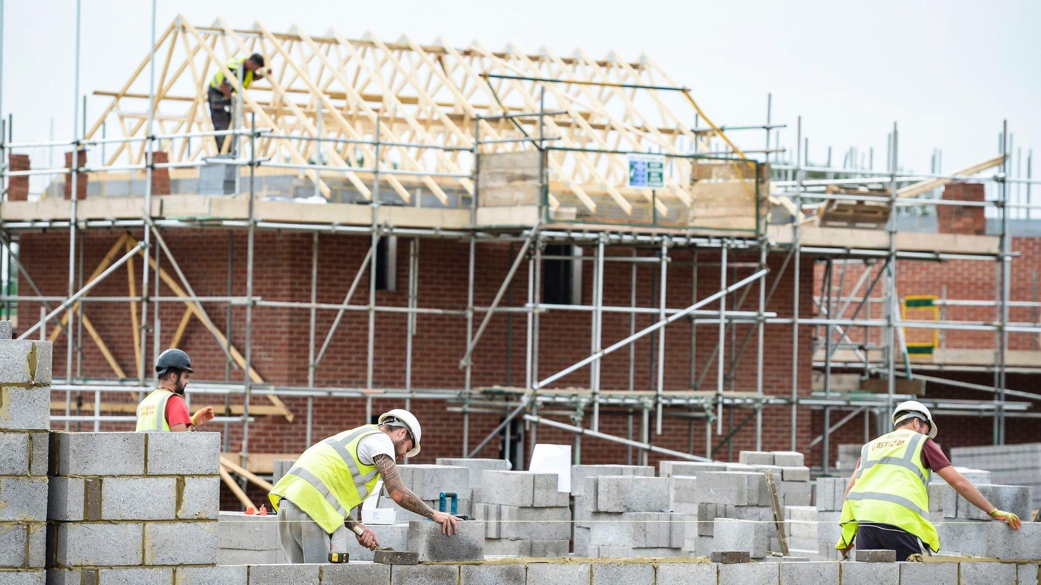 Workers on a building site