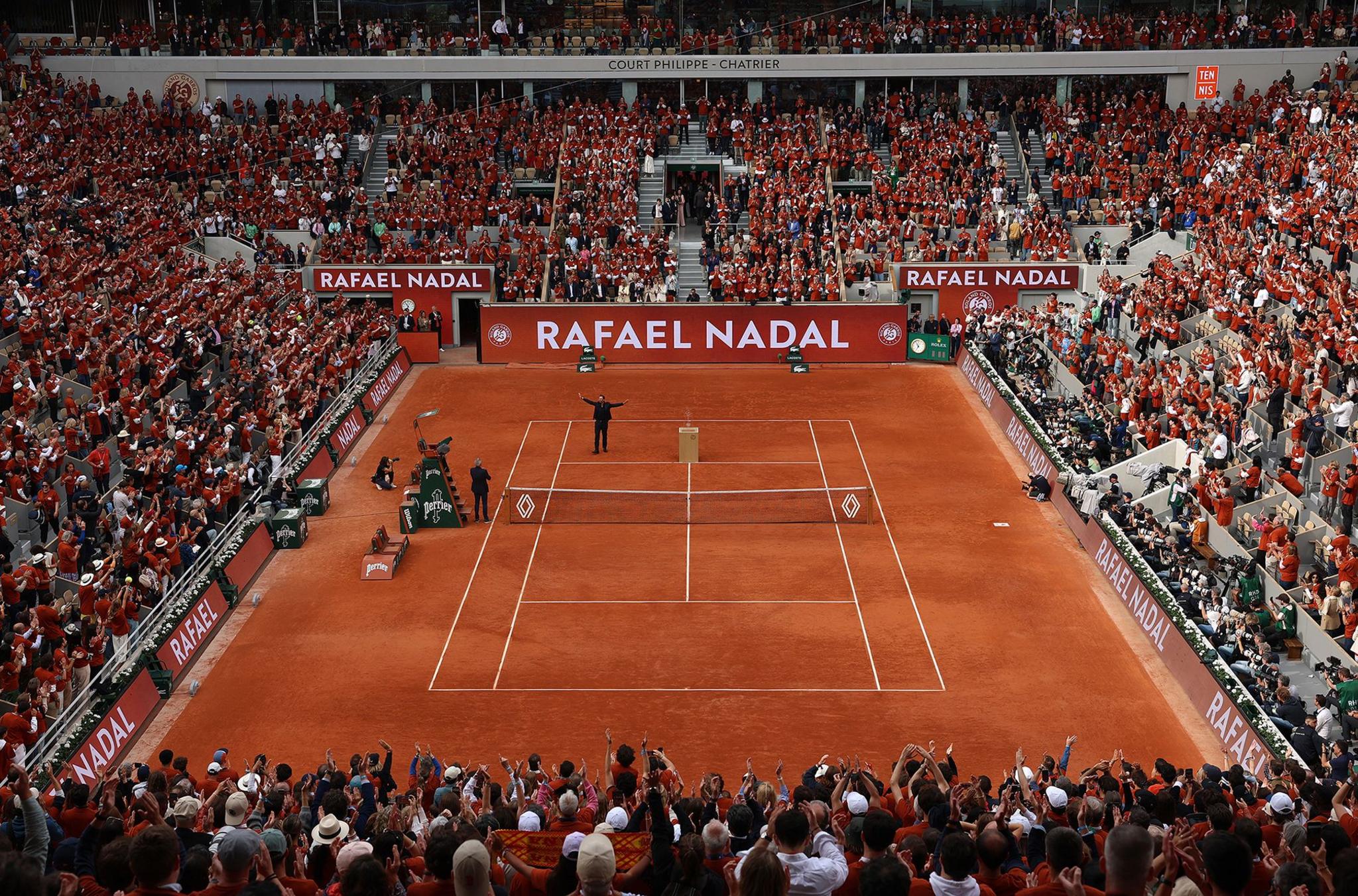 Rafael Nadal waves to the crowd on Court Philippe-Chatrier at the end of a ceremony held in his honour on Day One of the 2025 French Open at Roland Garros in Paris, France. Photo by Julian Finney