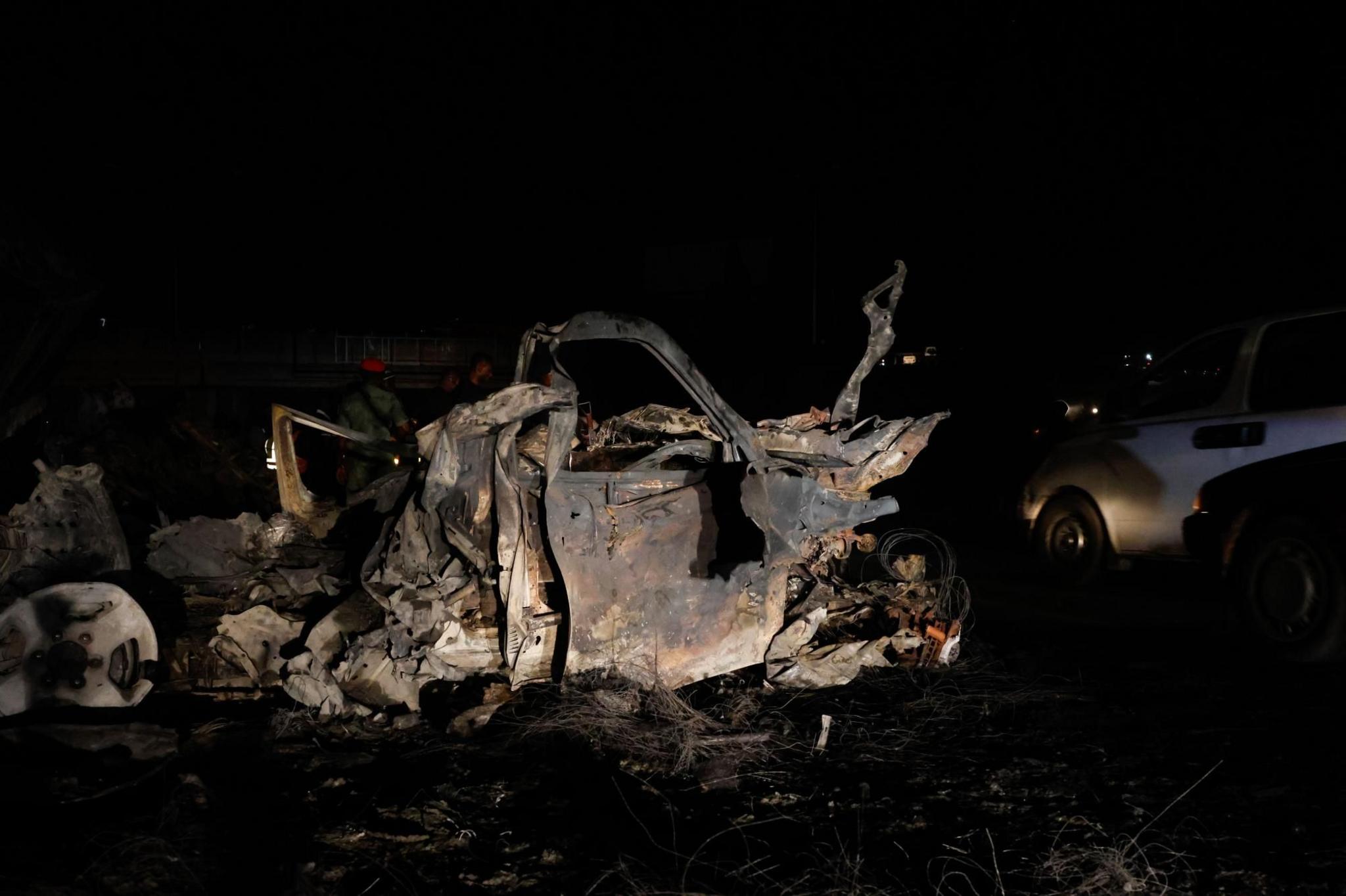 Wreckage of burnt vehicles following the explosion of a Compressed Natural Gas (CNG) truck near Karu Bridge in Abuja, Nigeria, 