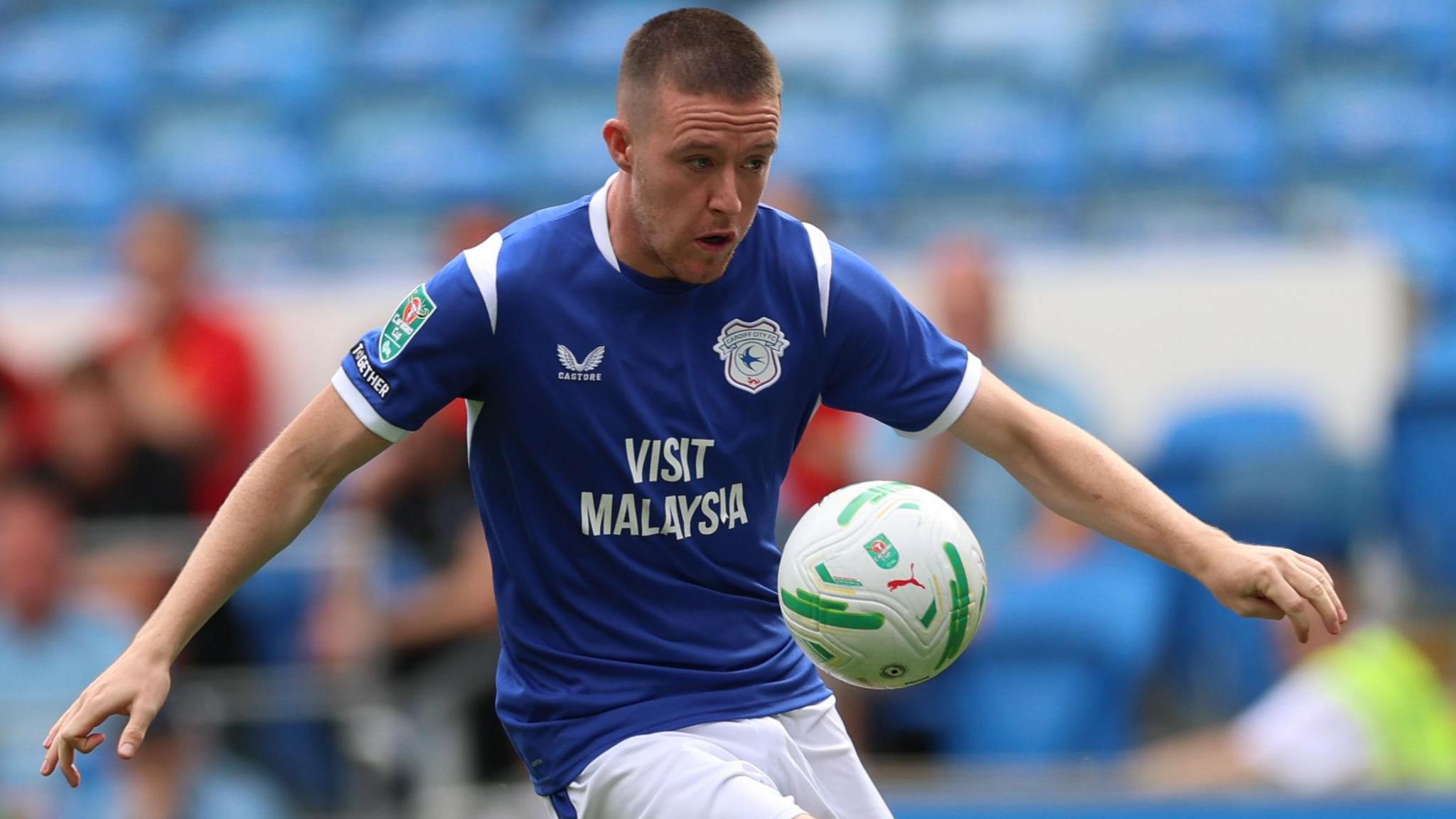Jack Moylan with the ball for Cardiff City