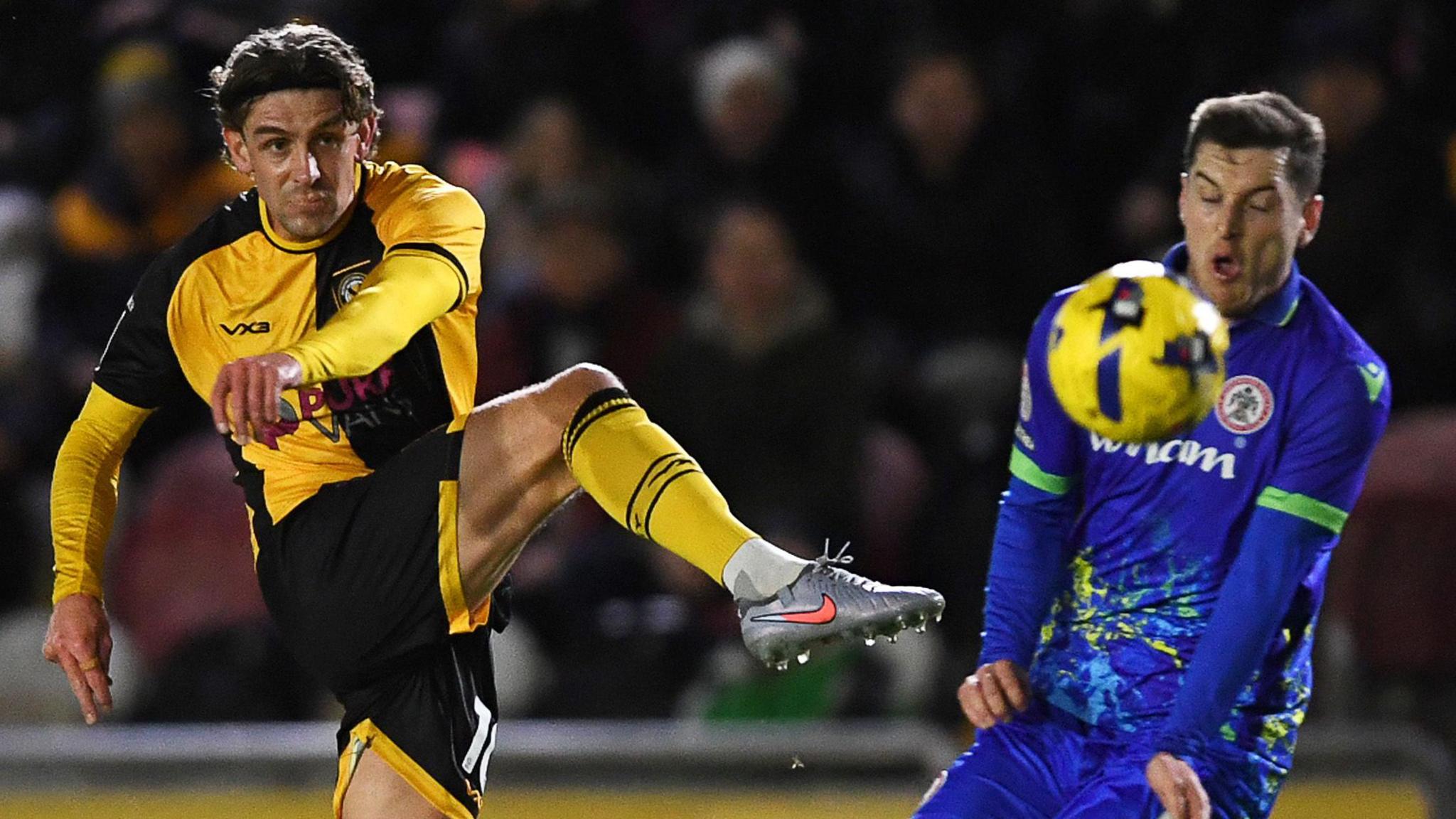Harrison Biggins has a shot at goal for Newport County against Accrington