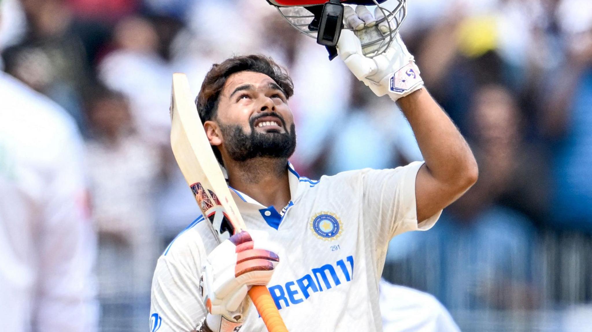 India batter Rishabh Pant celebrates hitting a century