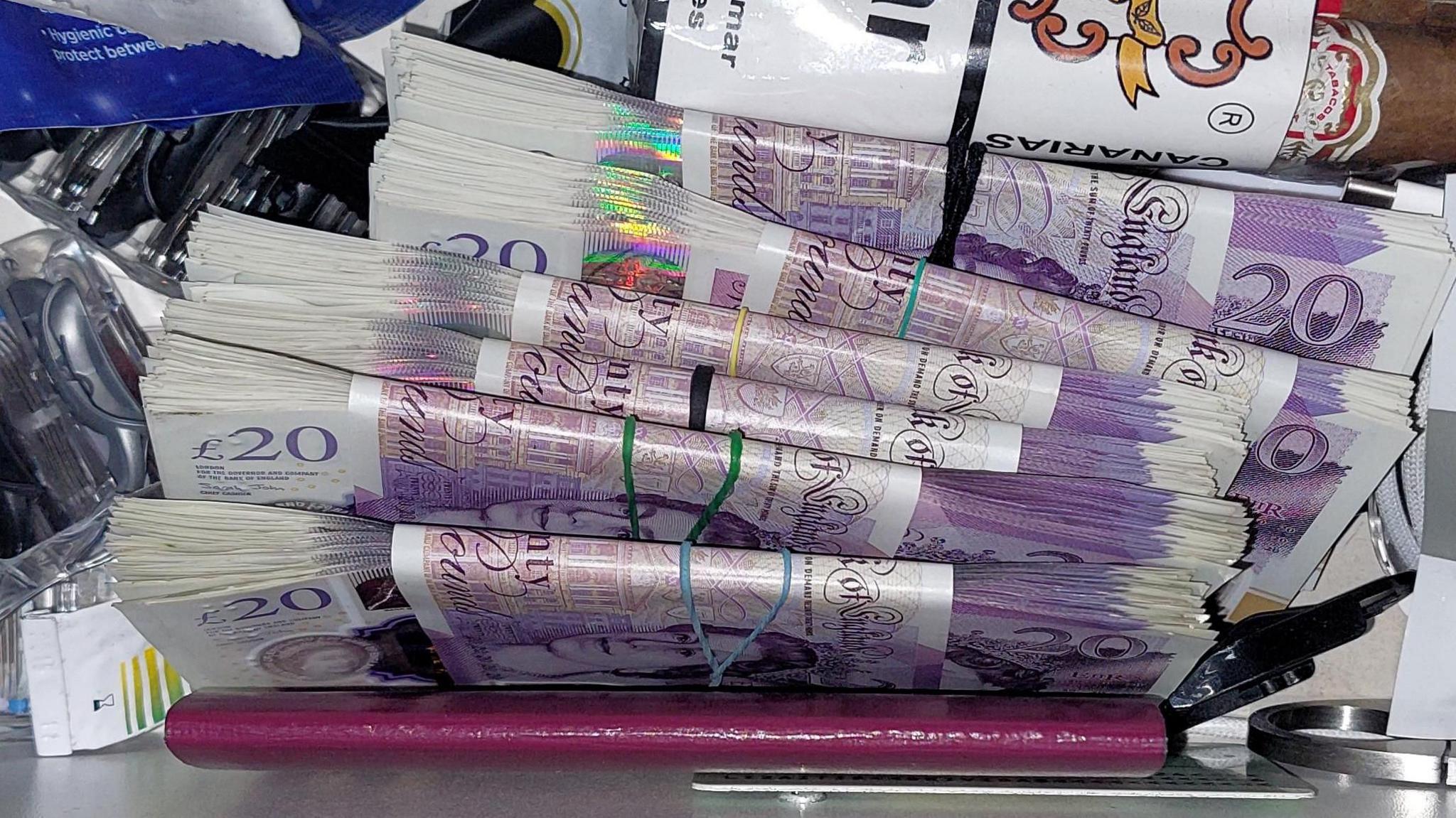 A drawer filled with £20 notes