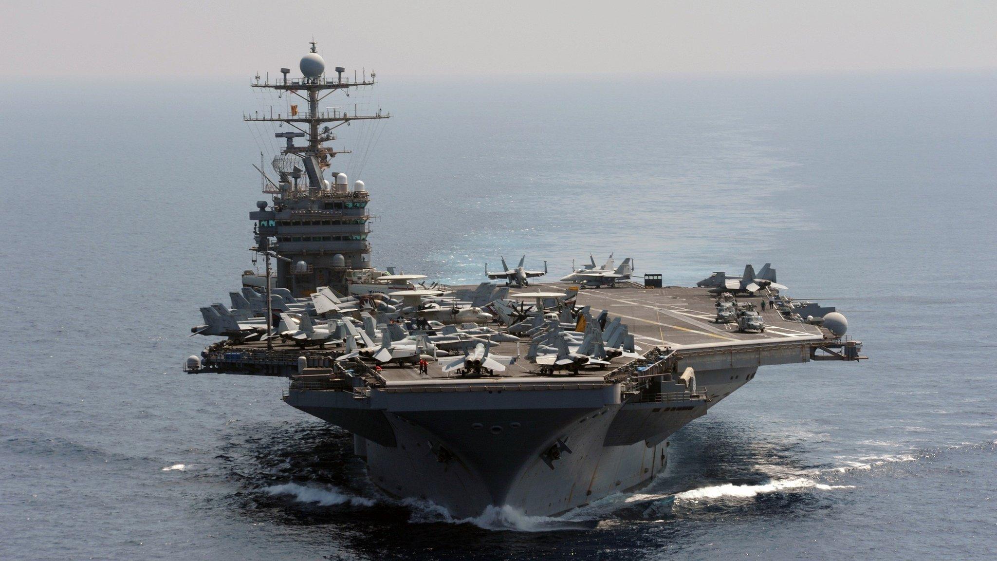 In this photo taken on Jan 18, 2012 and released by U.S. Navy, its aircraft carrier USS Abraham Lincoln transits the Indian Ocean