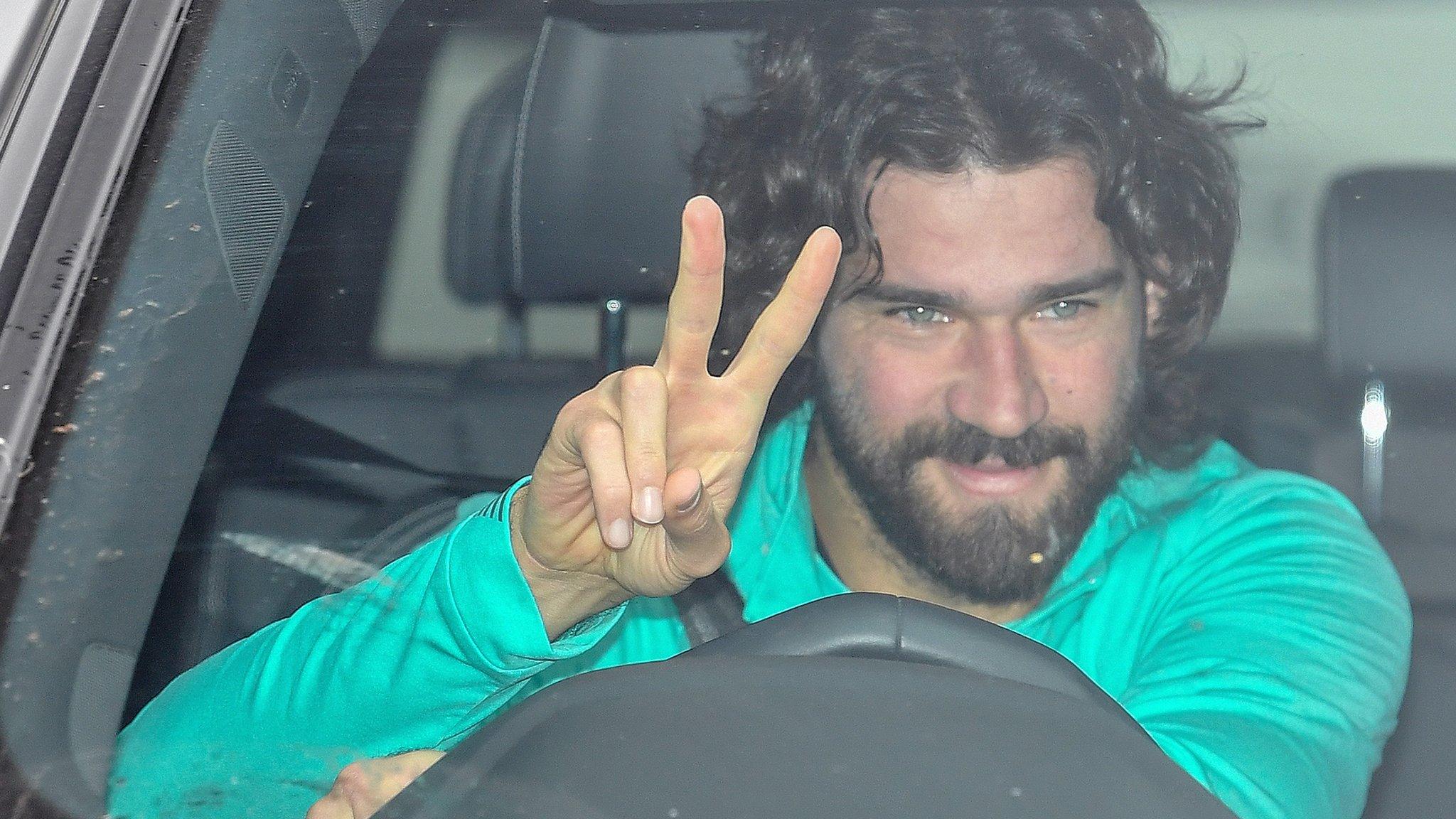 Liverpool-goalkeeper-Alisson-arriving-for-training