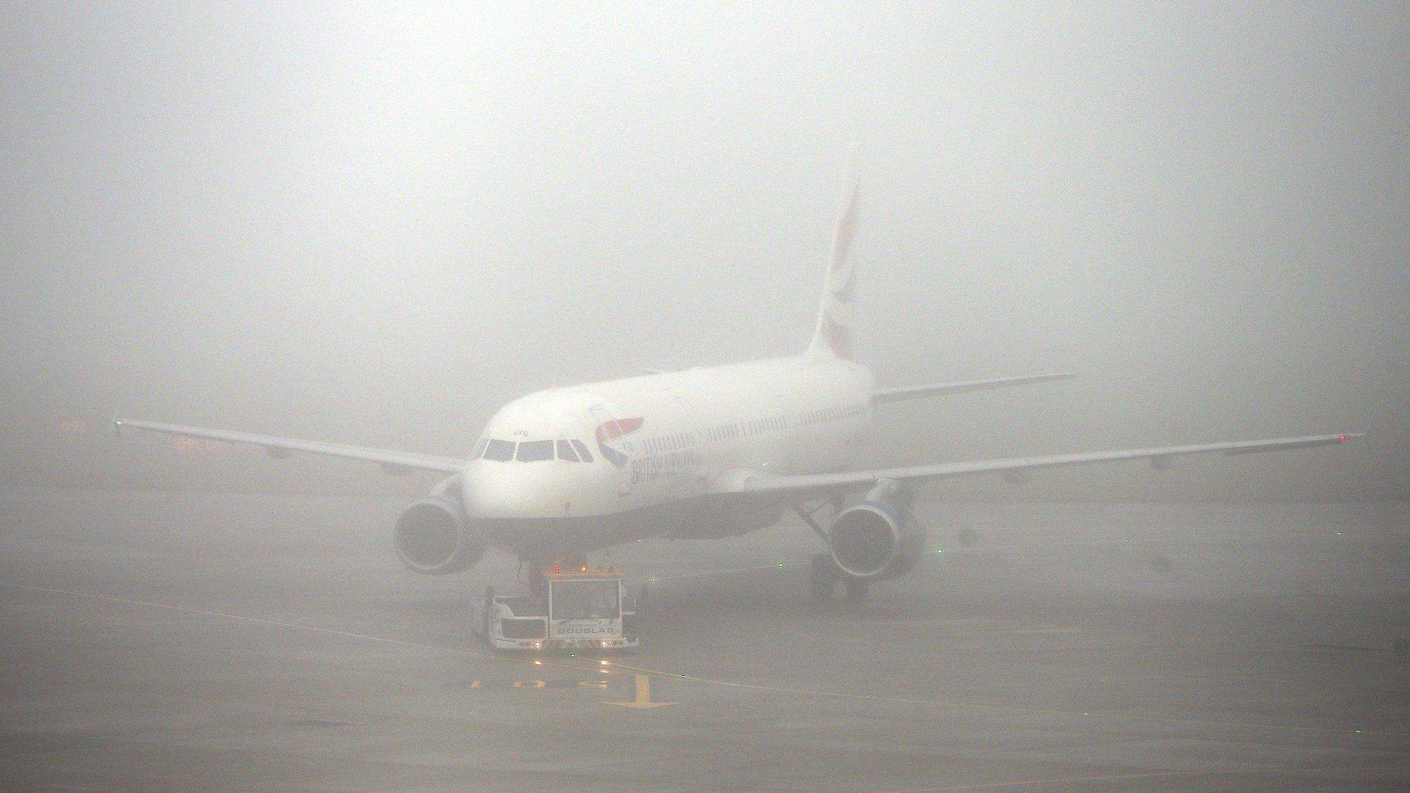 Plane in fog at Heathrow airport (2 Nov)