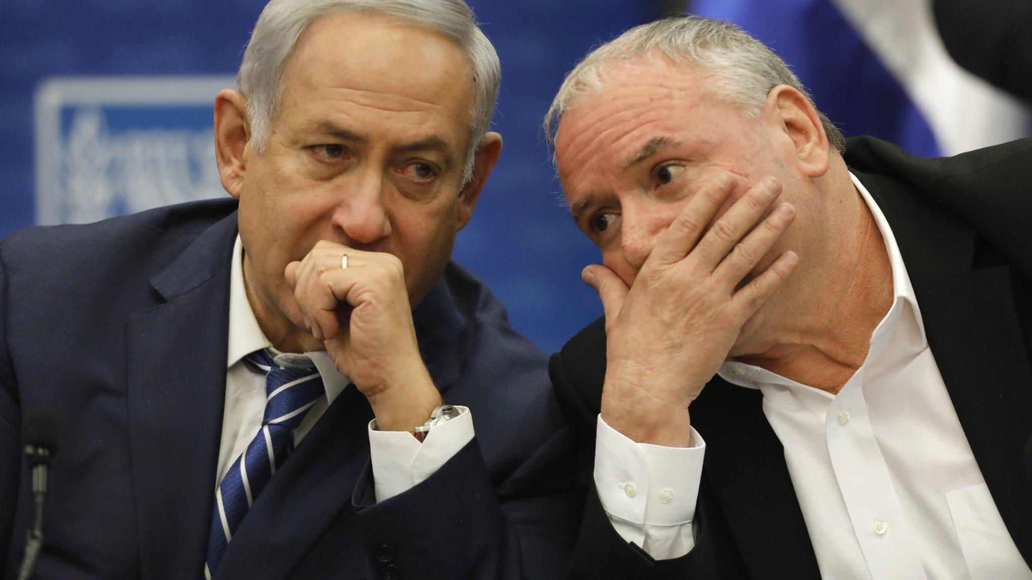 Israeli Prime Minister Benjamin Netanyahu (L) and lawmaker David Amsalem (R) attend a meeting of the Likud party at the Knesset, in Jerusalem, Israel (25 December 2017)