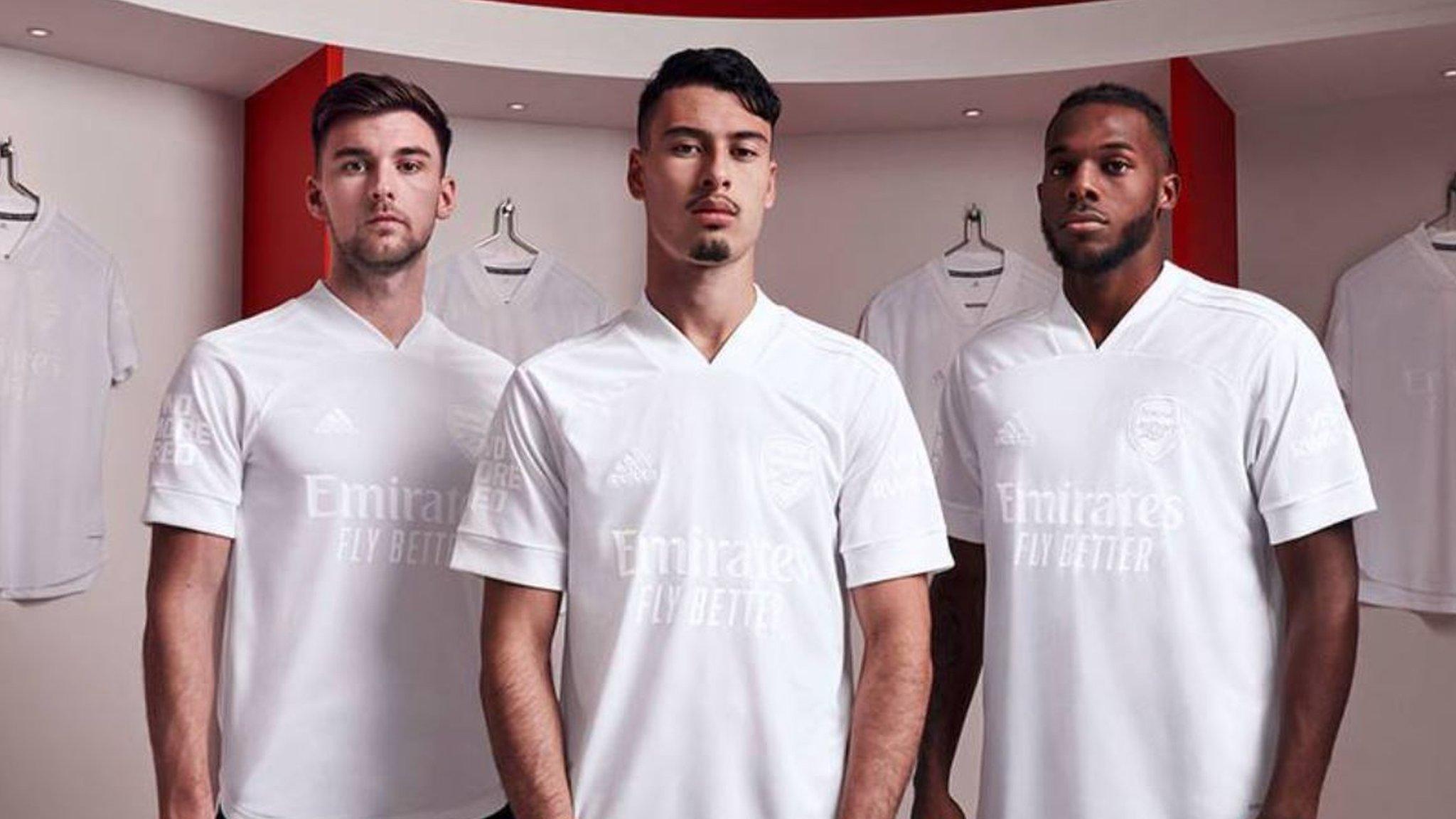 Arsenal players in white kit