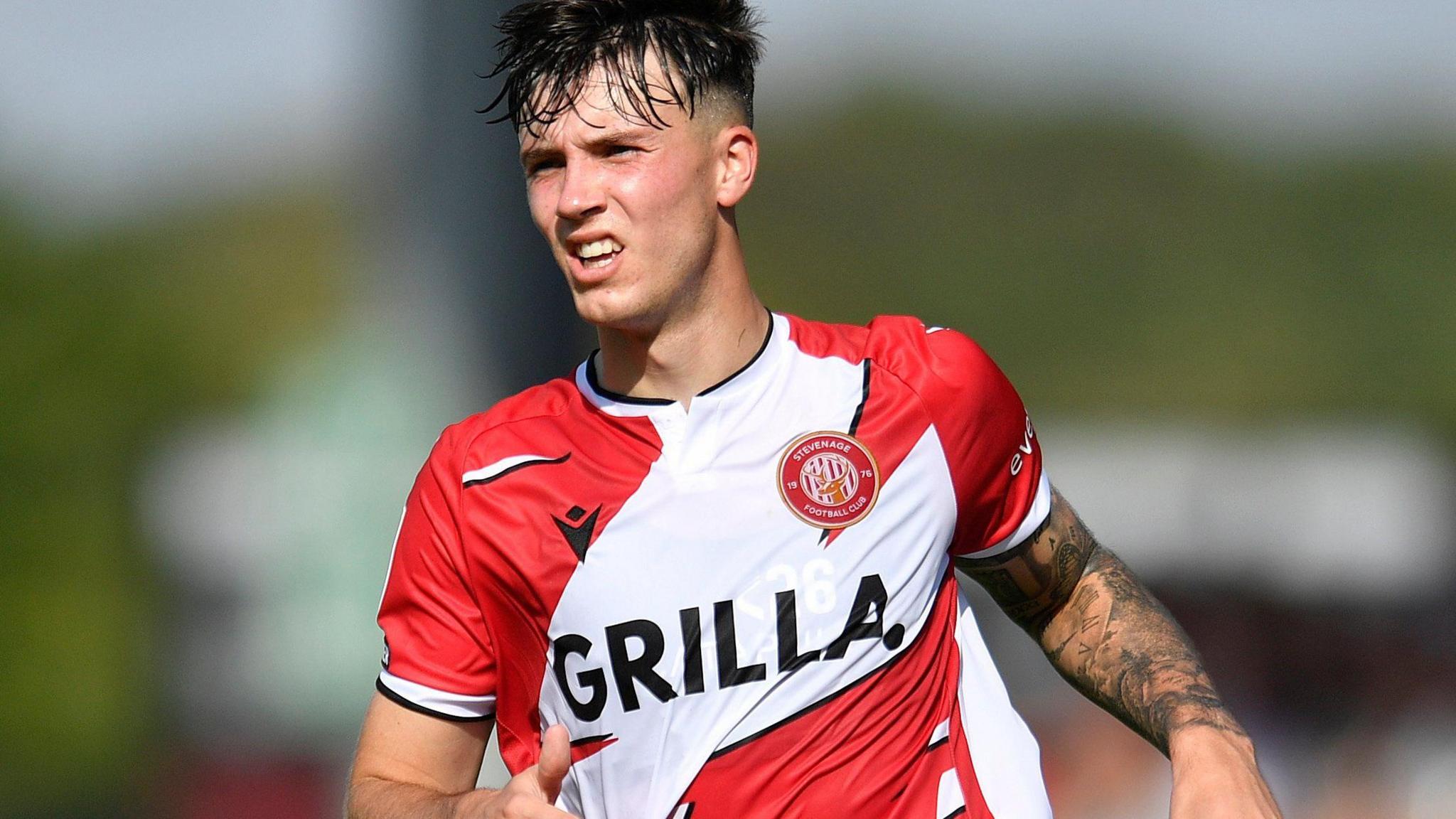 Striker Charlie McNeill in action for Stevenage