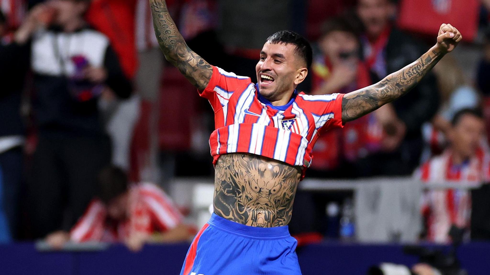 Angel Correa celebrates his goal for Atletico Madrid against city rivals Real