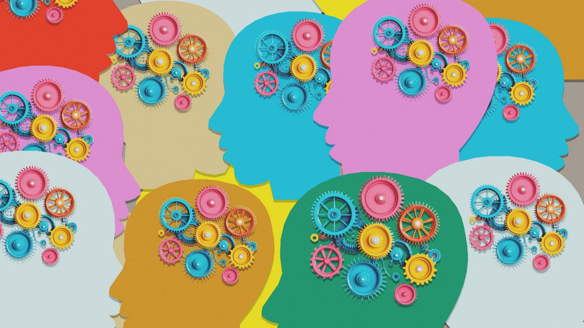 A colourful drawing showing lots of coloured cogs inside people's heads.