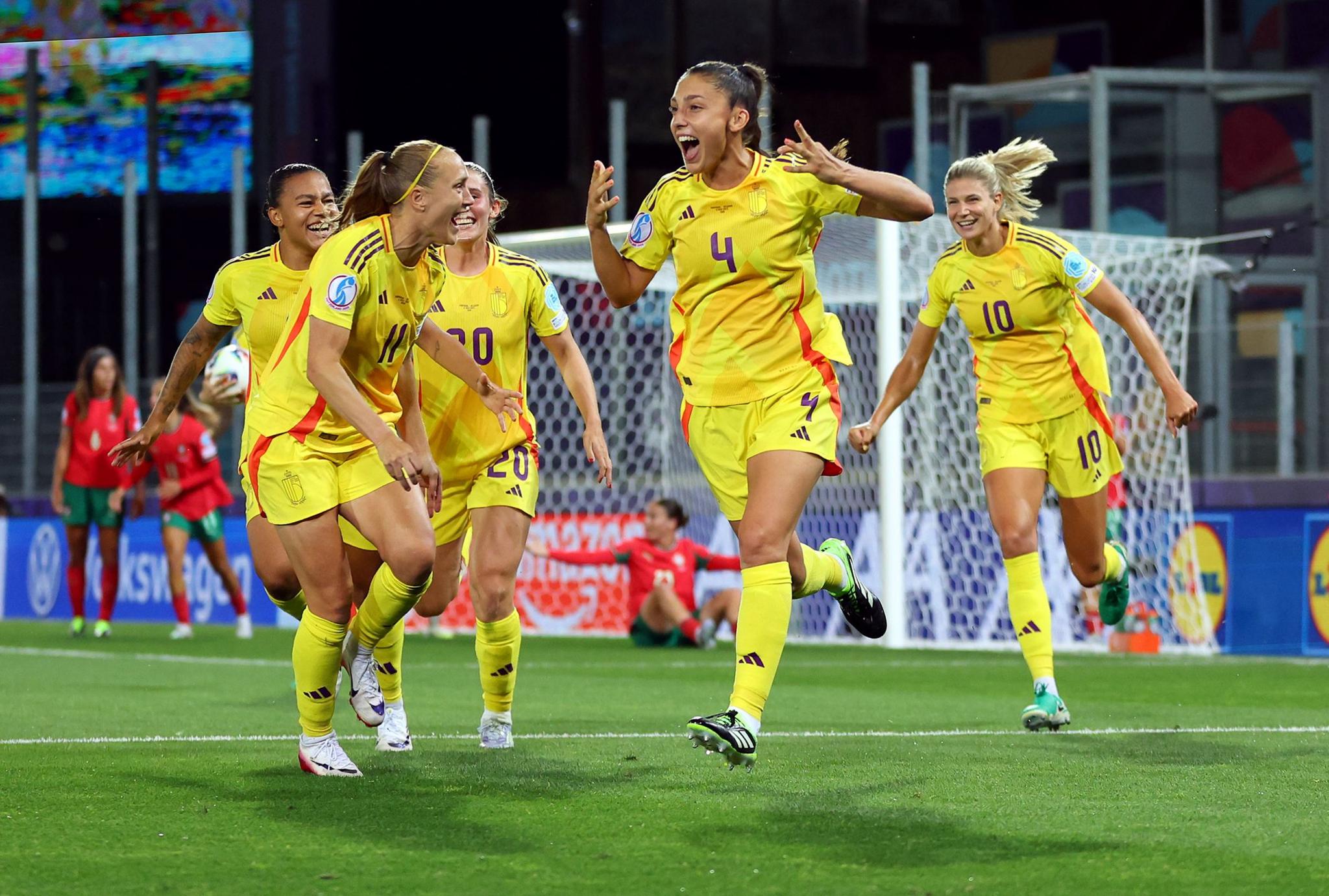Belgium's Amber Tysiak celebrates scoring a goal with teammates which was later ruled out following a VAR review. Photo by Molly Darlington