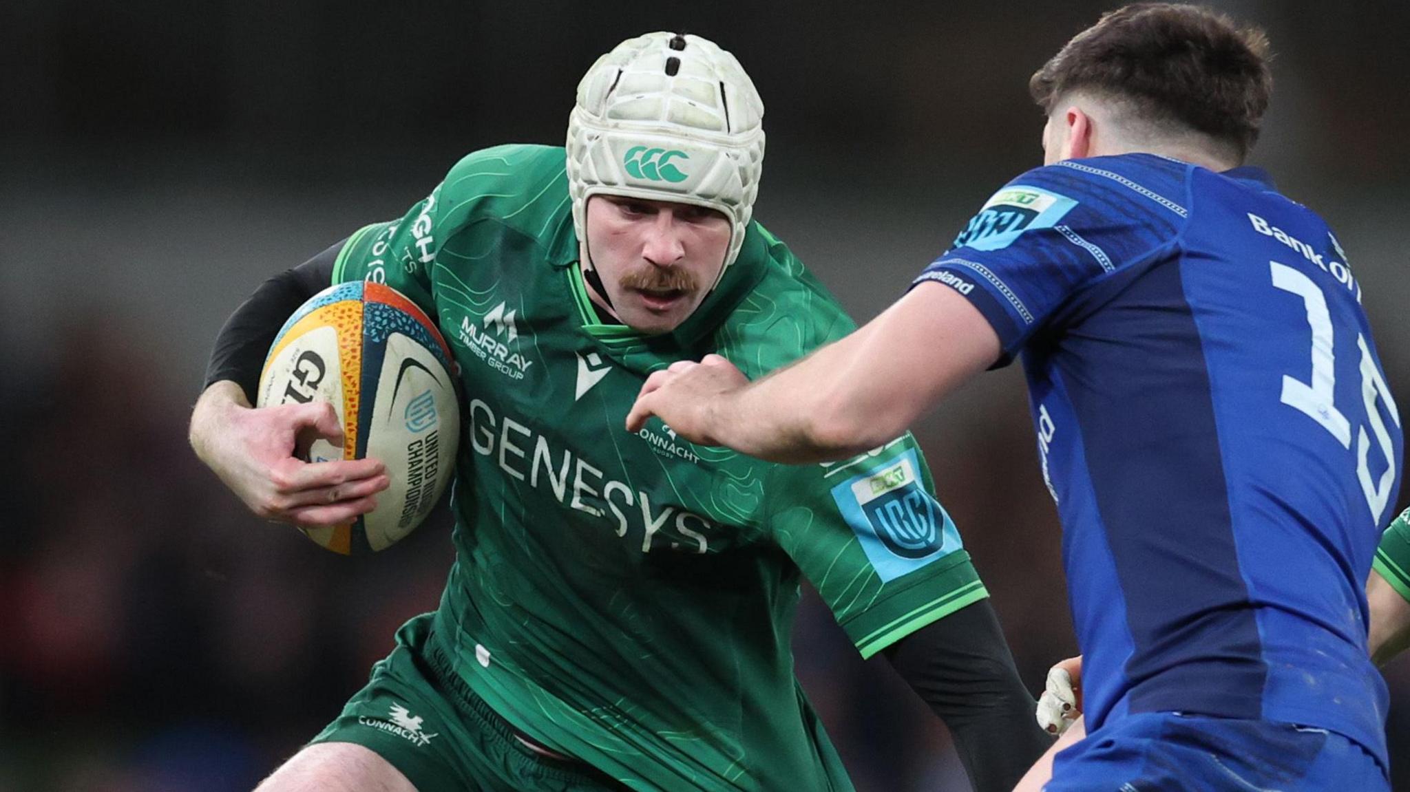 Mack Hansen attempts to get past Leinster's Jimmy O'Brien at the Aviva Stadium on 21 December