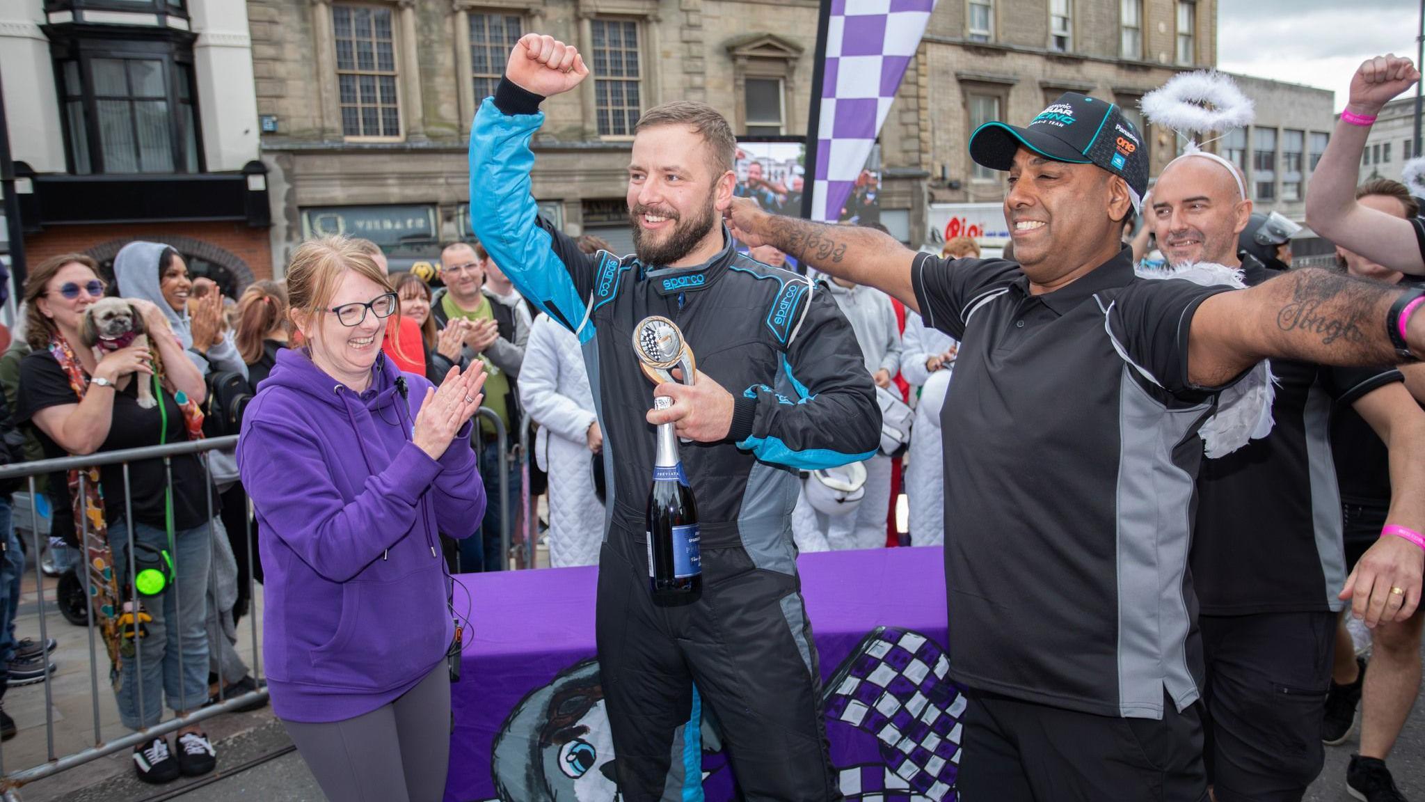 Winners celebrate at the finish line