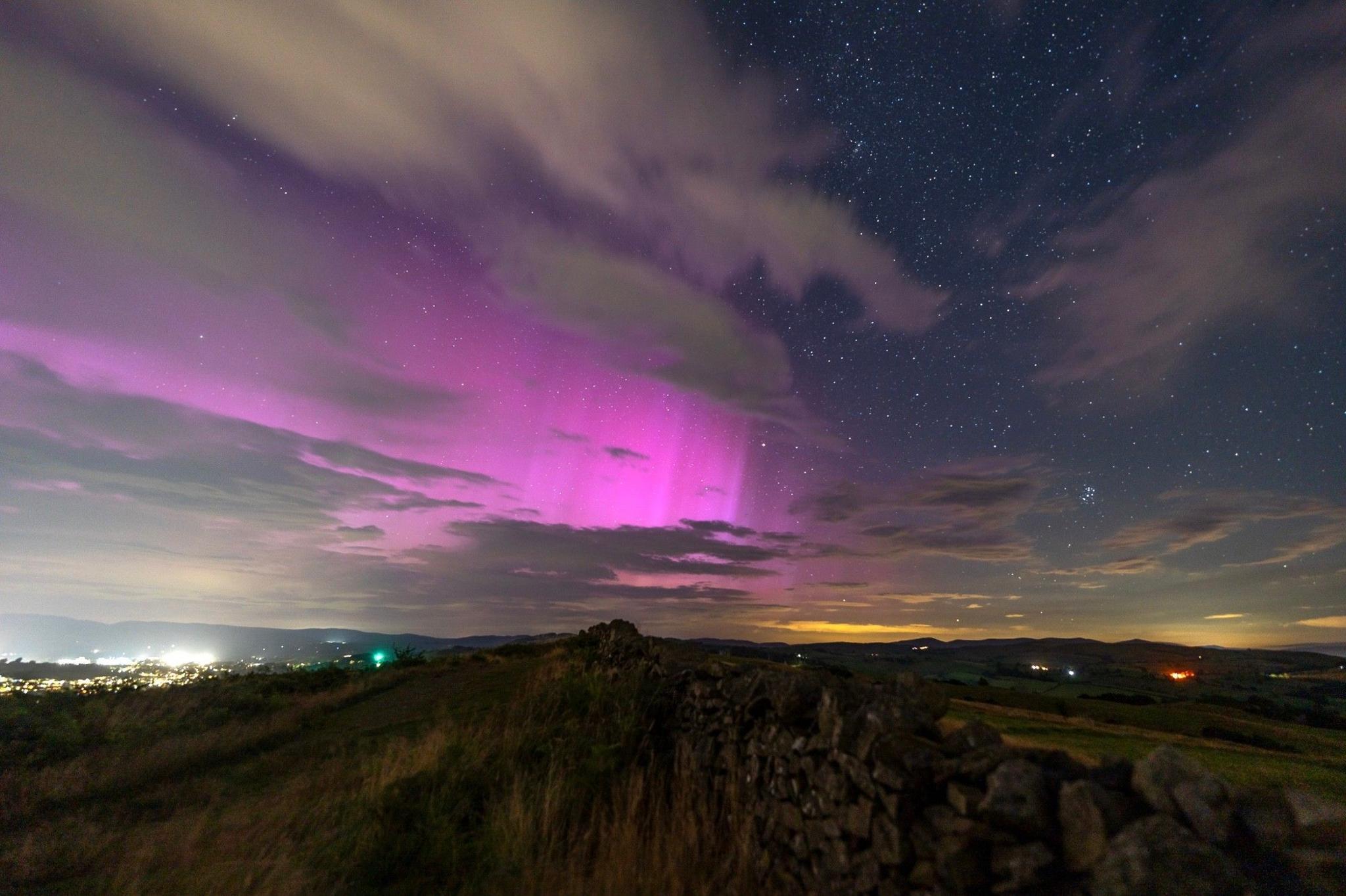 Northern lights and clouds in the sky in Cumbria