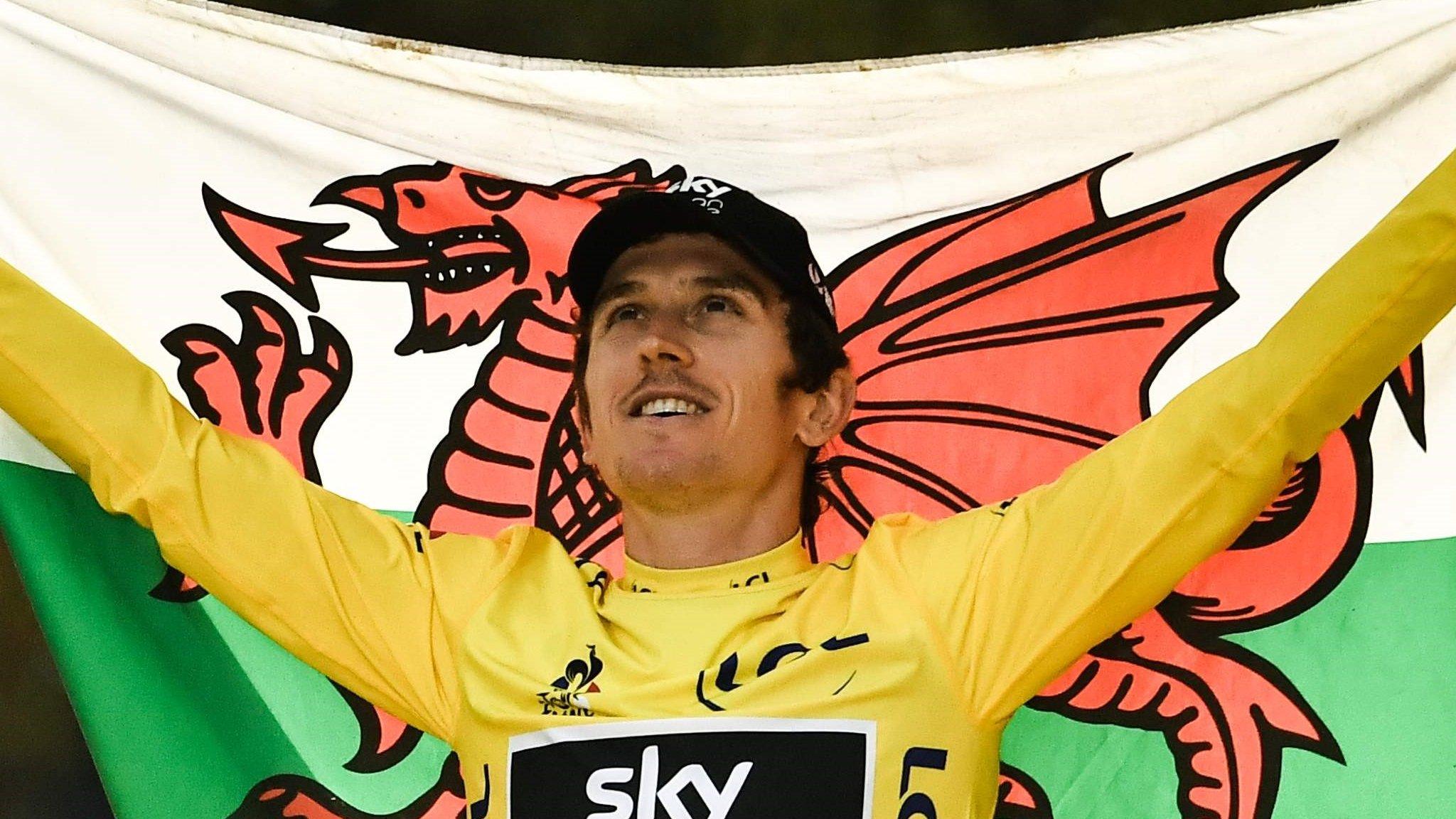 Geraint Thomas with the Welsh flag.