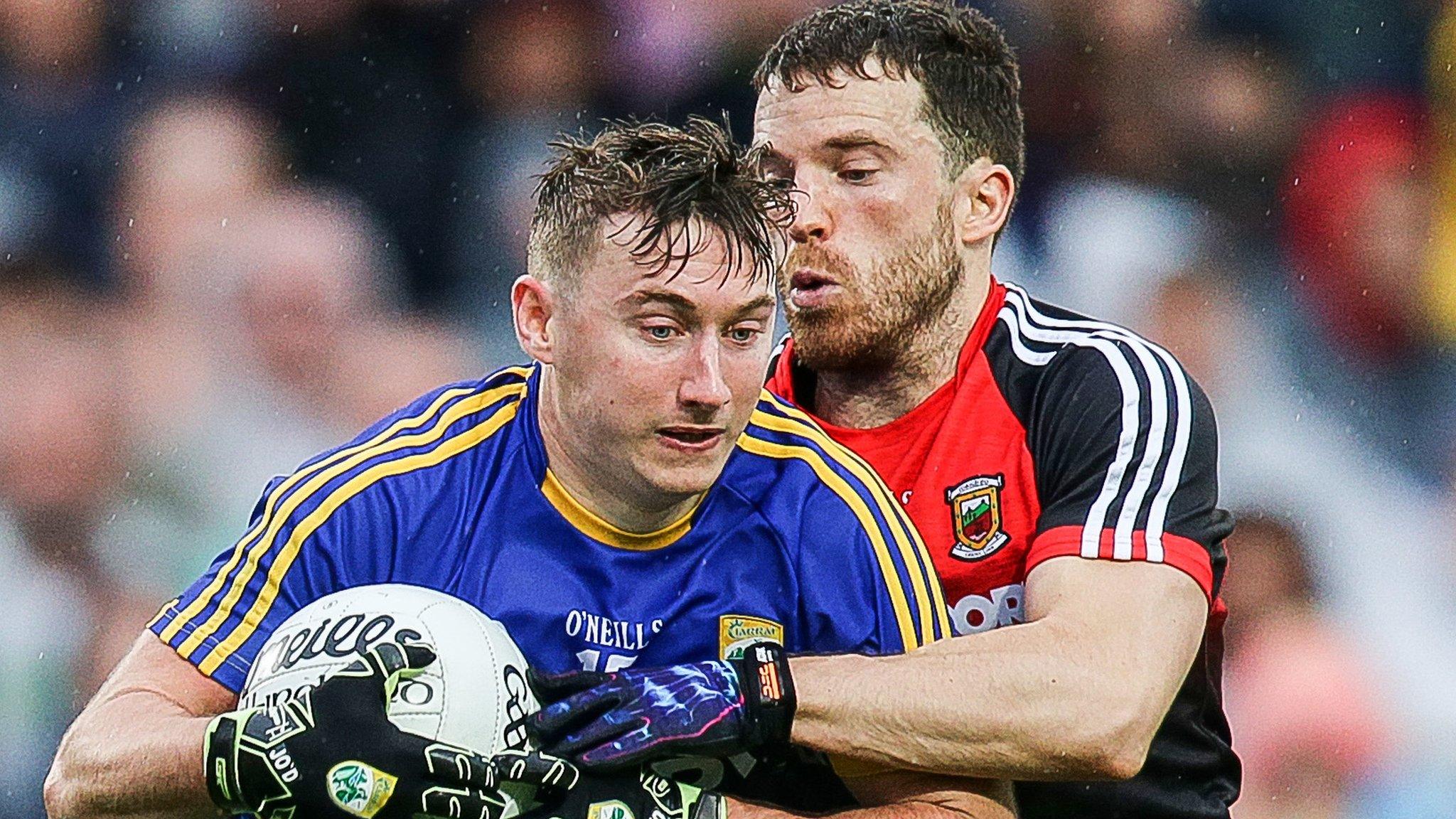 Kerry's James O'Donoghue is tackled by Donal Vaughan in the All-Ireland semi-final