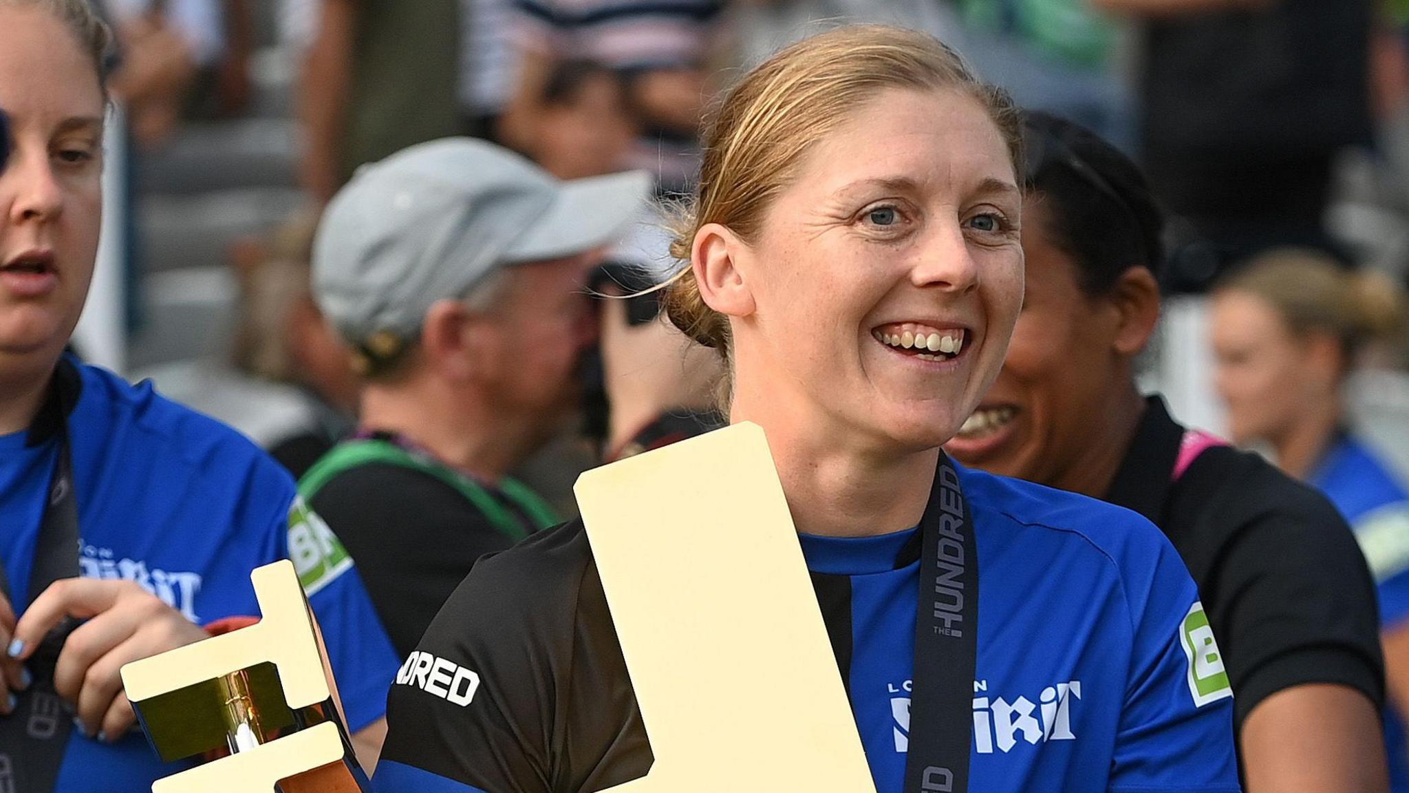 London Spirit captain Heather Knight with The Hundred trophy in 2024