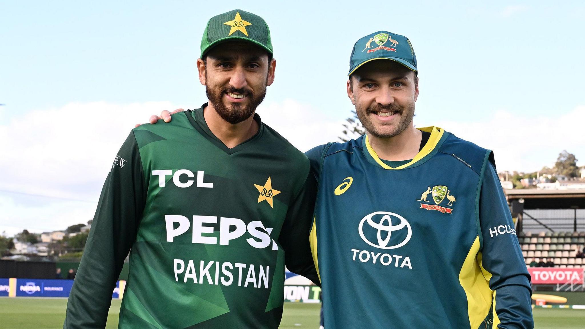Pakistan's Salman Ali Agha and Australia's Josh Inglis before a Twenty20 international in 2024